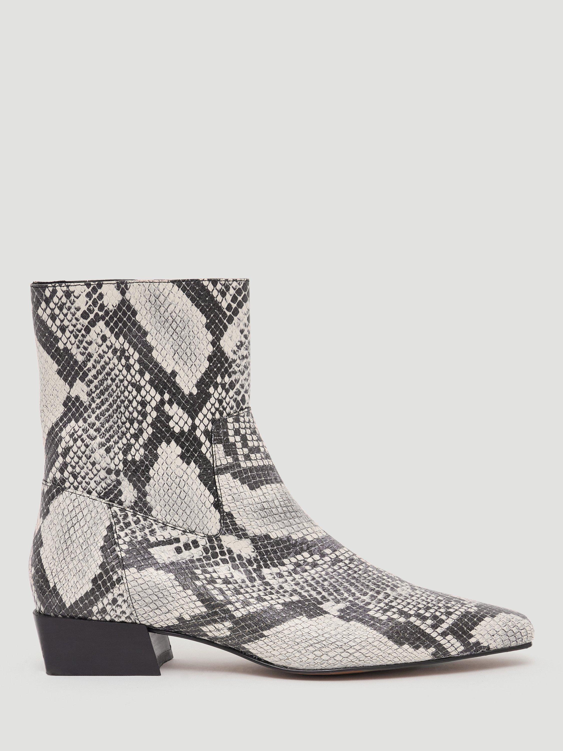 Product image 1 of 4, which shows HUSH Leather Snake Print Ankle Boots, Black/White, 3
