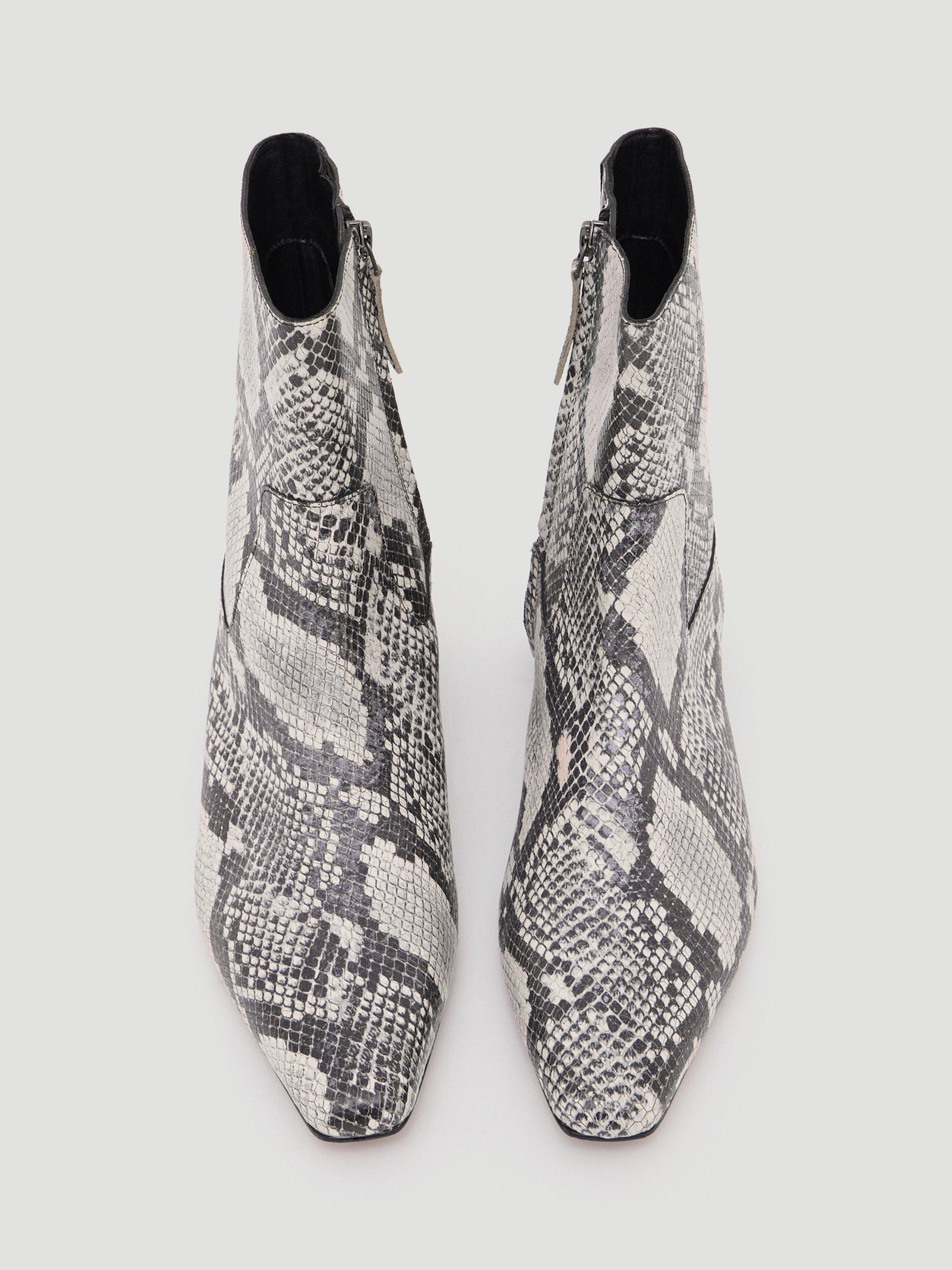 Product image 2 of 4, which shows HUSH Leather Snake Print Ankle Boots, Black/White, 3