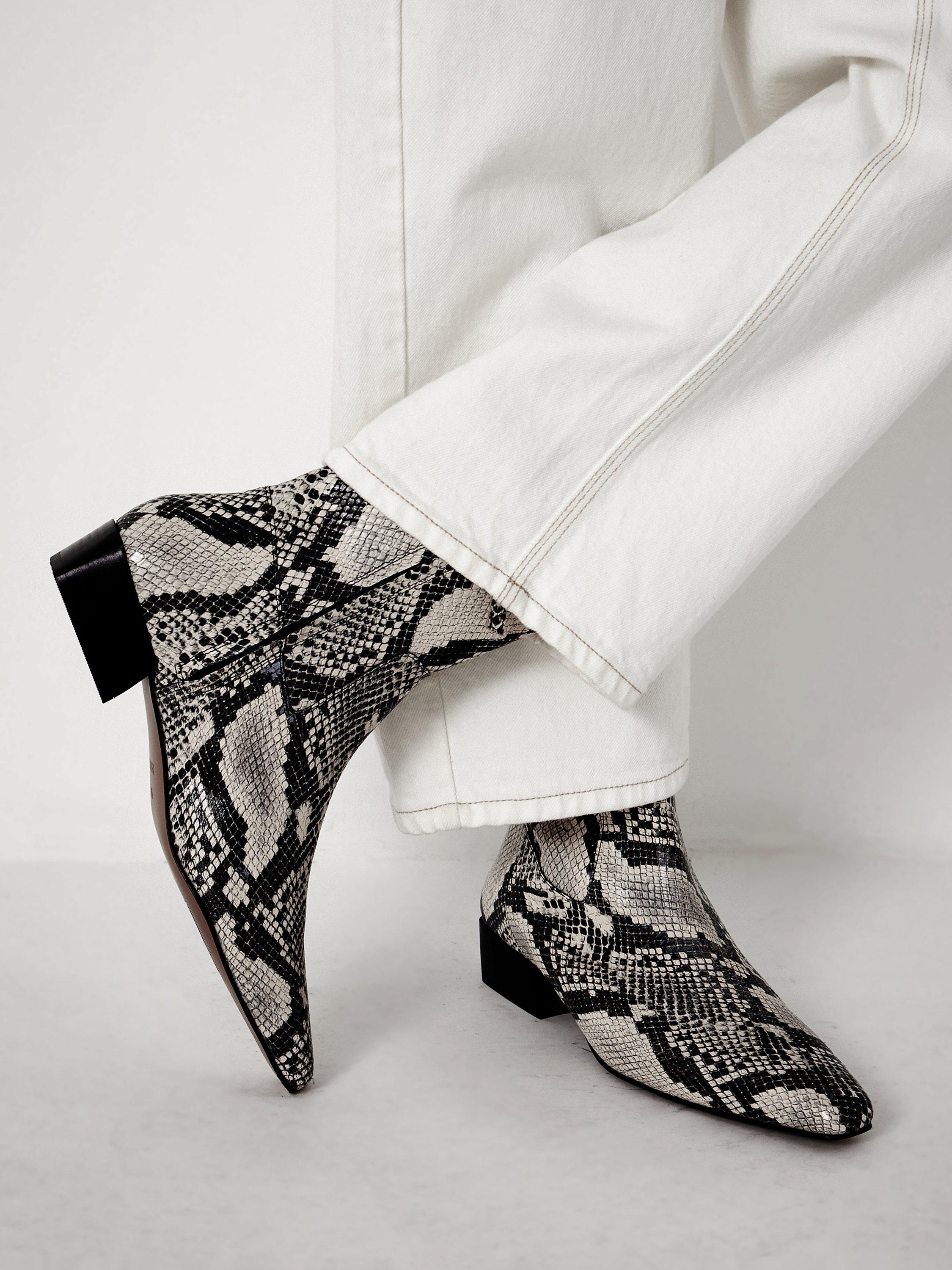 Product image 3 of 4, which shows HUSH Leather Snake Print Ankle Boots, Black/White, 3