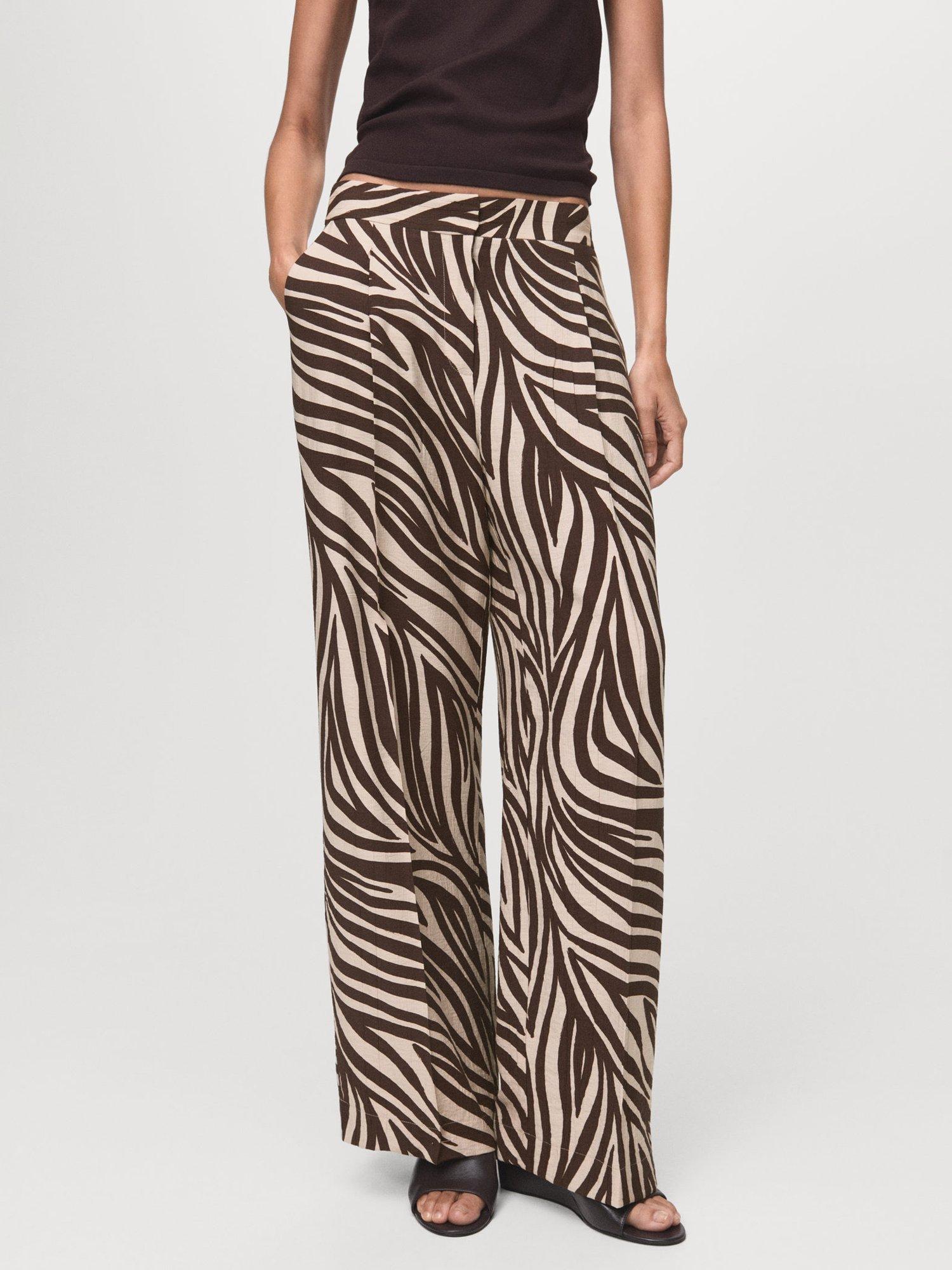 Product image 1 of 8, which shows Mango Nikita Zebra Print Trousers, Black/Brown, 10