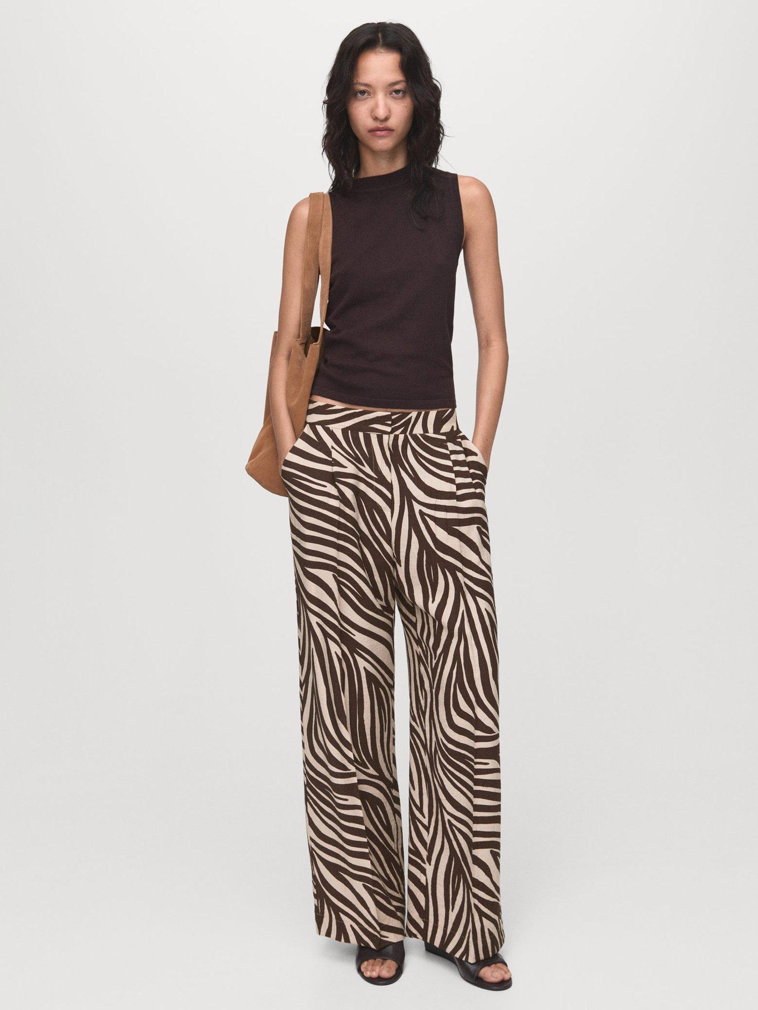 Product image 2 of 8, which shows Mango Nikita Zebra Print Trousers, Black/Brown, 10