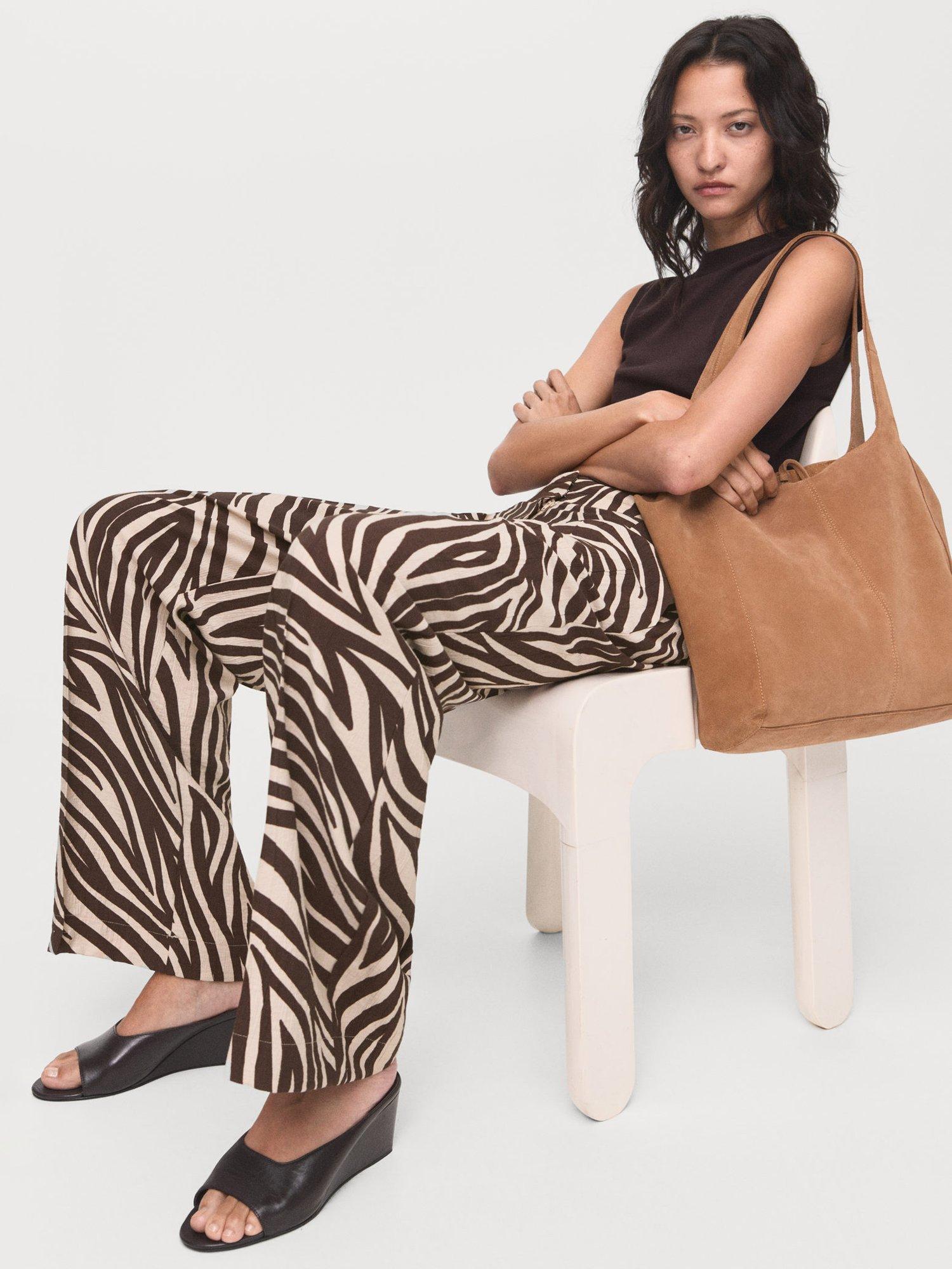 Product image 7 of 8, which shows Mango Nikita Zebra Print Trousers, Black/Brown, 10