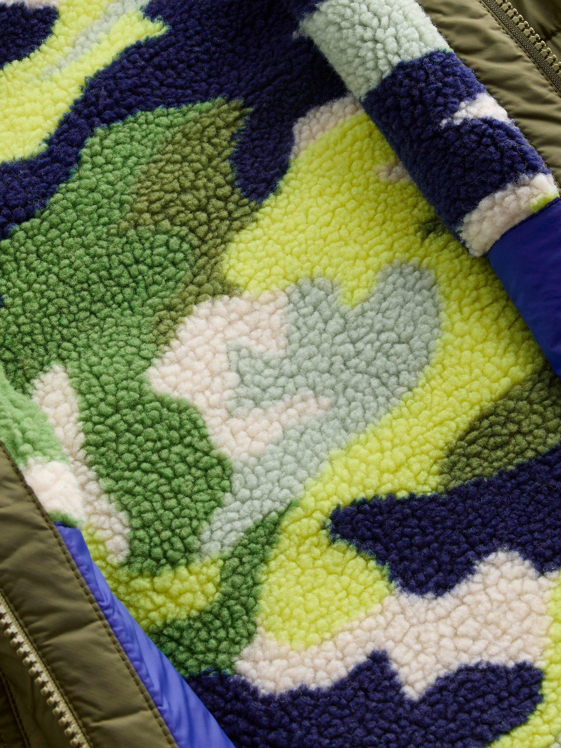 Product image 4 of 4, which shows Mini Boden Kids' Reversible Cotton Borg/Colour Block Jacket, Green Camo, 3-4 years