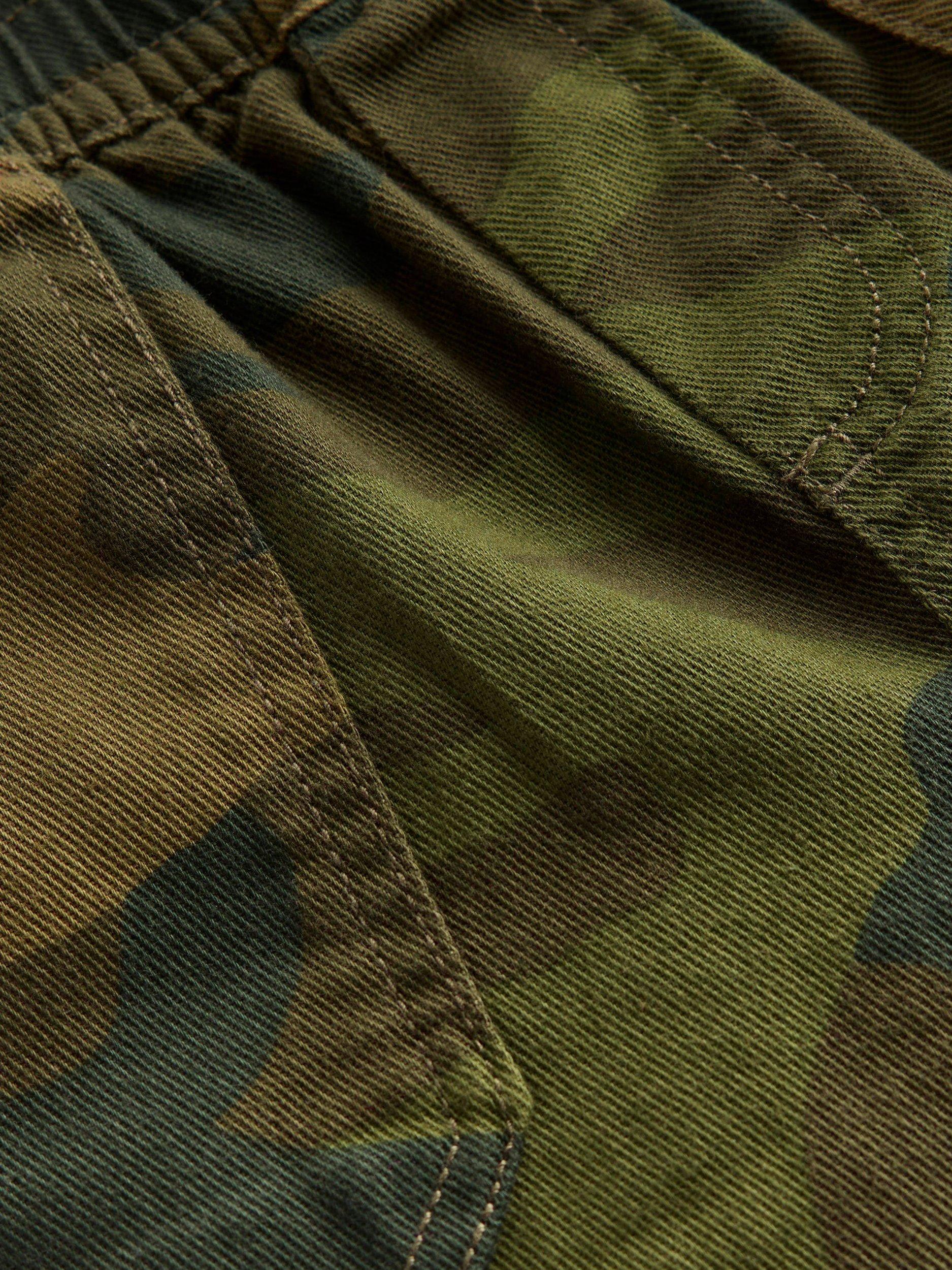 Product image 3 of 3, which shows Mini Boden Kids' Pull-On Cotton Blend Camouflage Trousers, Khaki, 2-3 years