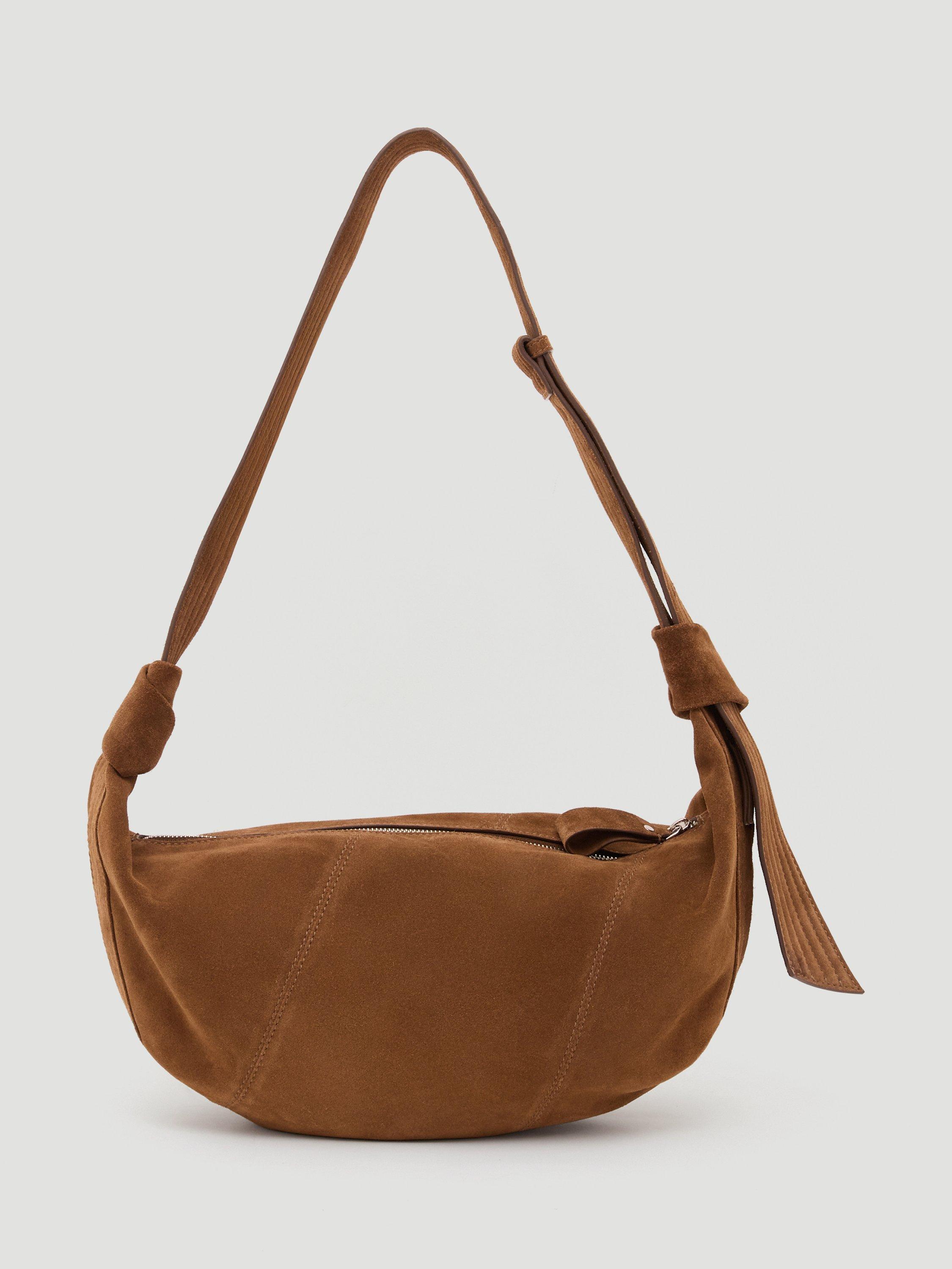 Product image 1 of 5, which shows HUSH Suede Leather Crescent Shoulder Bag, Tan, One Size