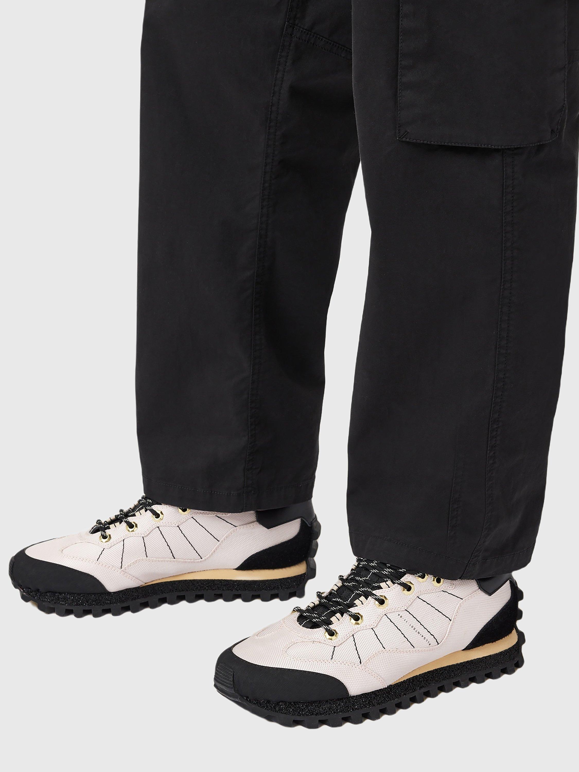 Product image 2 of 6, which shows AllSaints Nevis Suede Blend Trainers, Blush White/Black, EU45