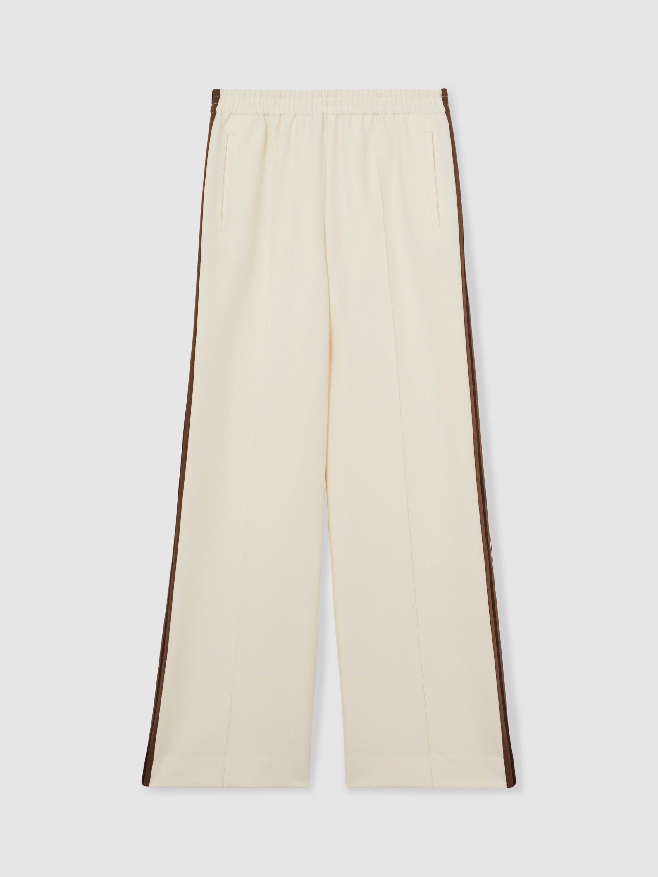 Product image 3 of 5, which shows Reiss Petite Robyn Side Stripe Trousers, Cream, 14Pt
