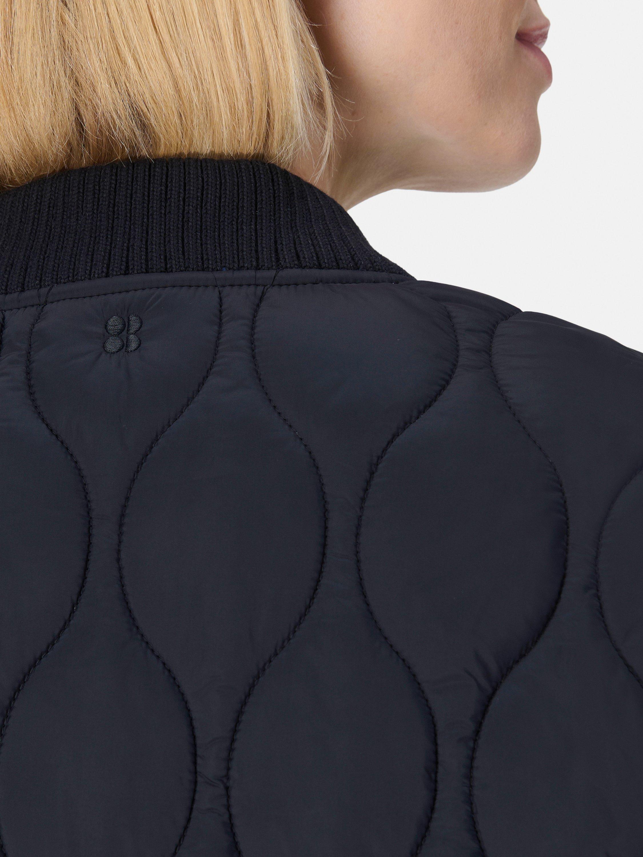 Product image 7 of 8, which shows Sweaty Betty On The Move Quilted Jacket, Black, XXS
