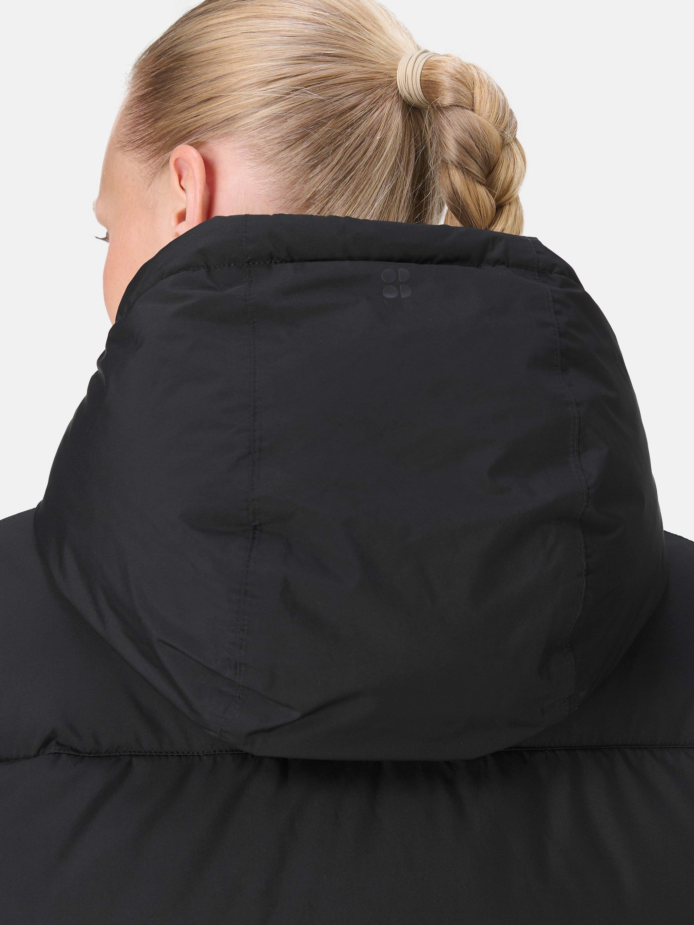 Product image 4 of 8, which shows Sweaty Betty Nimbus Longline Waterproof Puffer Coat, Black, XXS