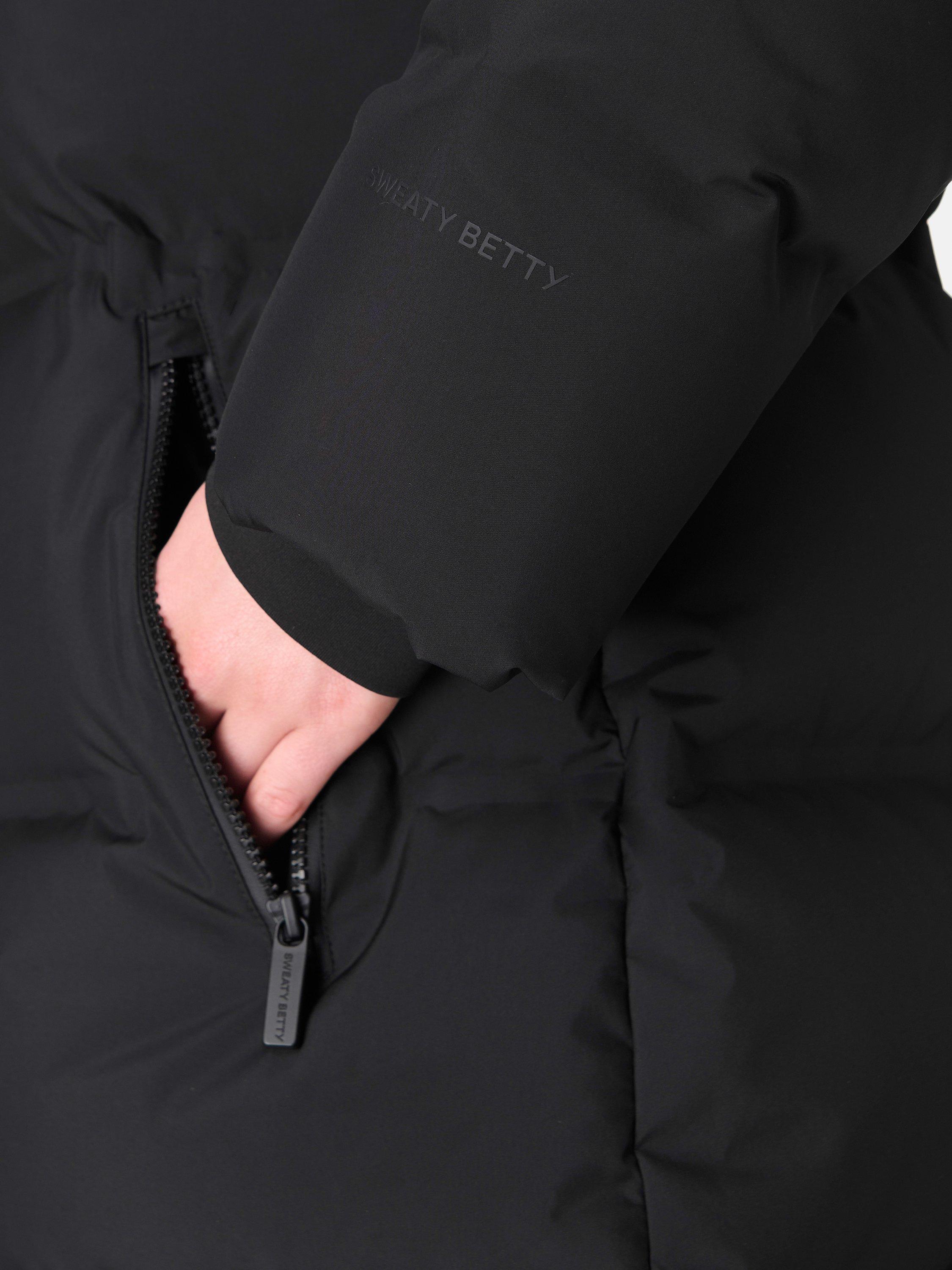 Product image 5 of 8, which shows Sweaty Betty Nimbus Longline Waterproof Puffer Coat, Black, XXS