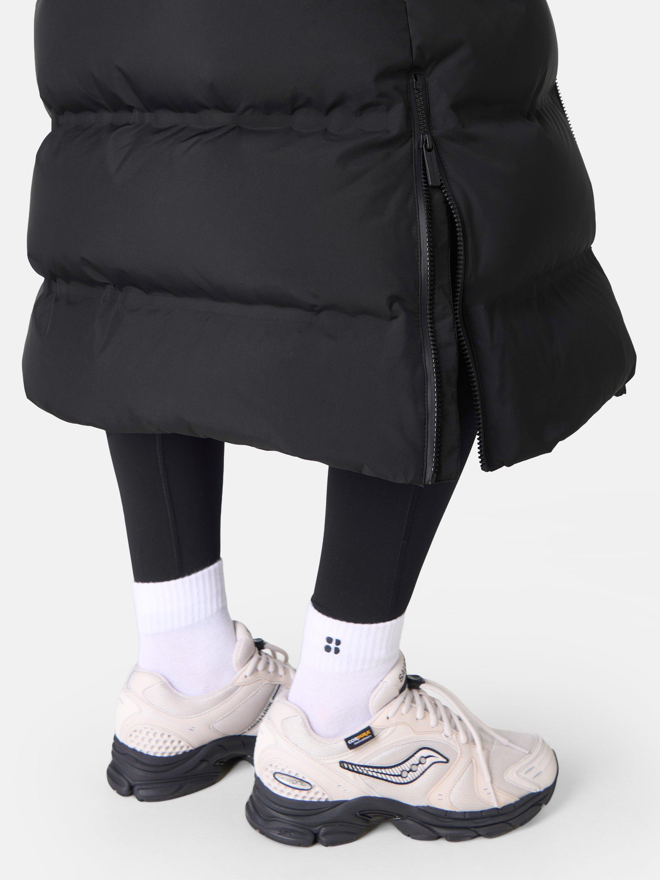 Product image 6 of 8, which shows Sweaty Betty Nimbus Longline Waterproof Puffer Coat, Black, XXS