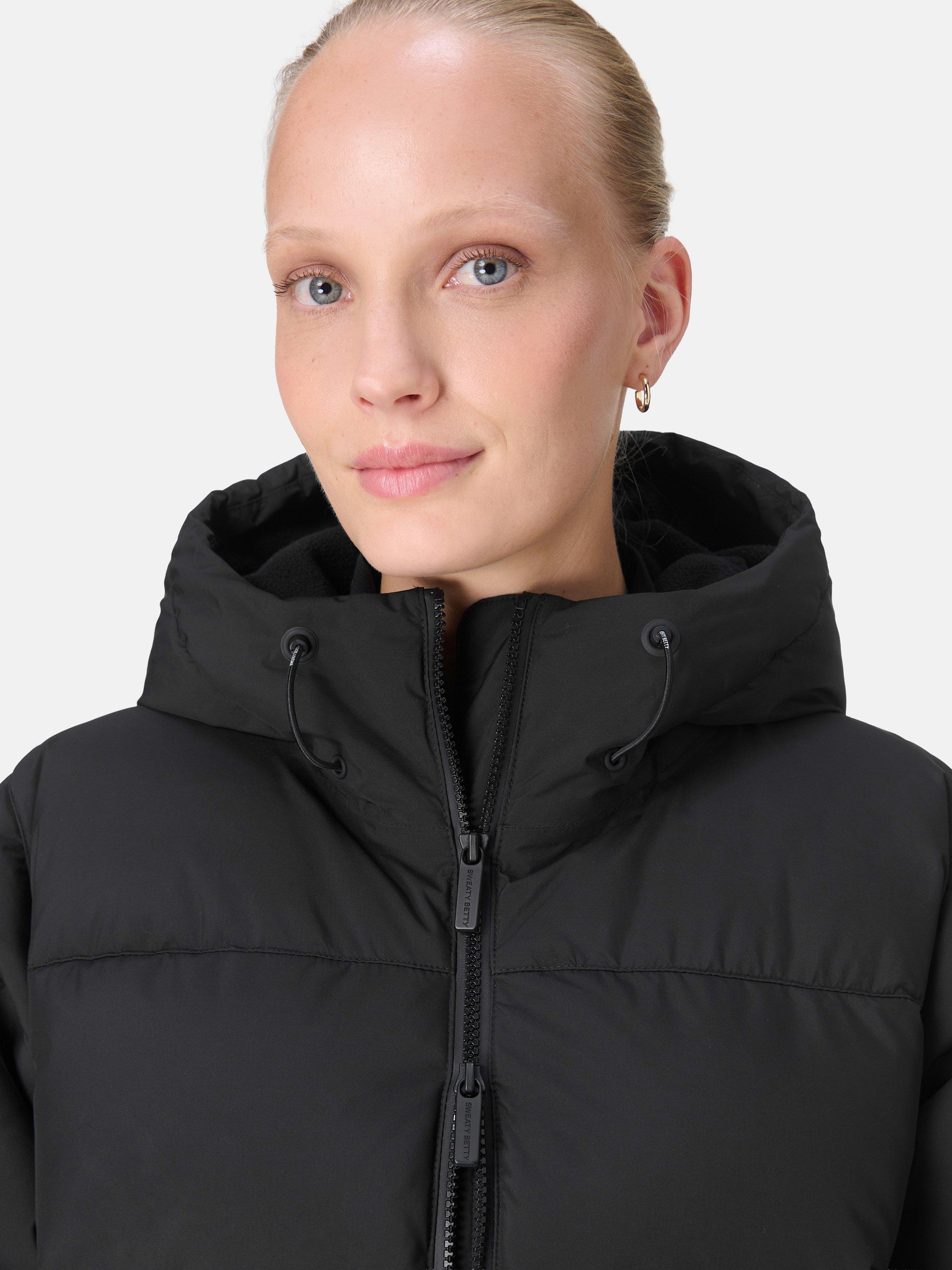 Product image 7 of 8, which shows Sweaty Betty Nimbus Longline Waterproof Puffer Coat, Black, XXS