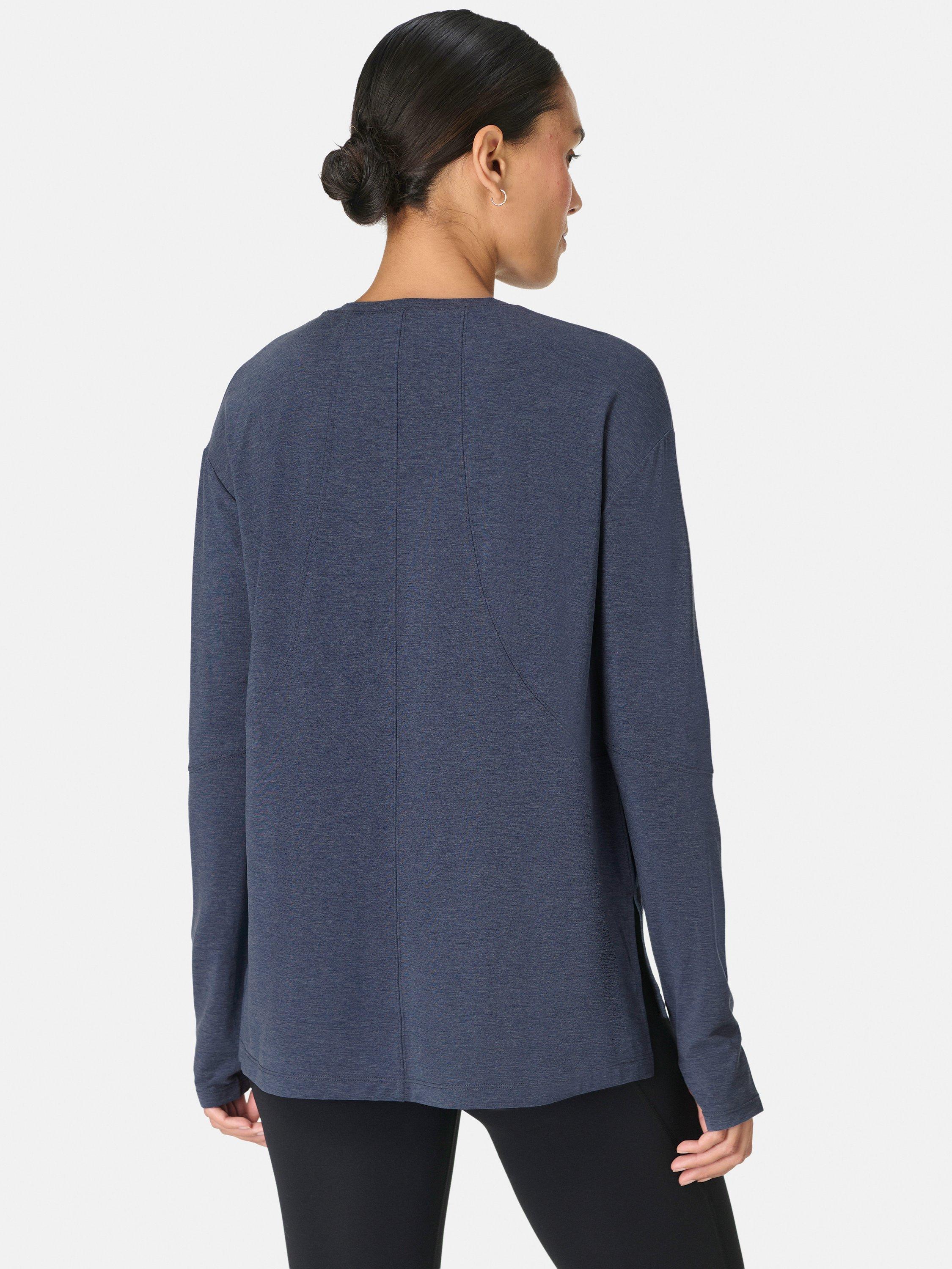 Product image 4 of 7, which shows Sweaty Betty Soft Flow Studio Longline Long Sleeve Top, Navy Blue, XXS