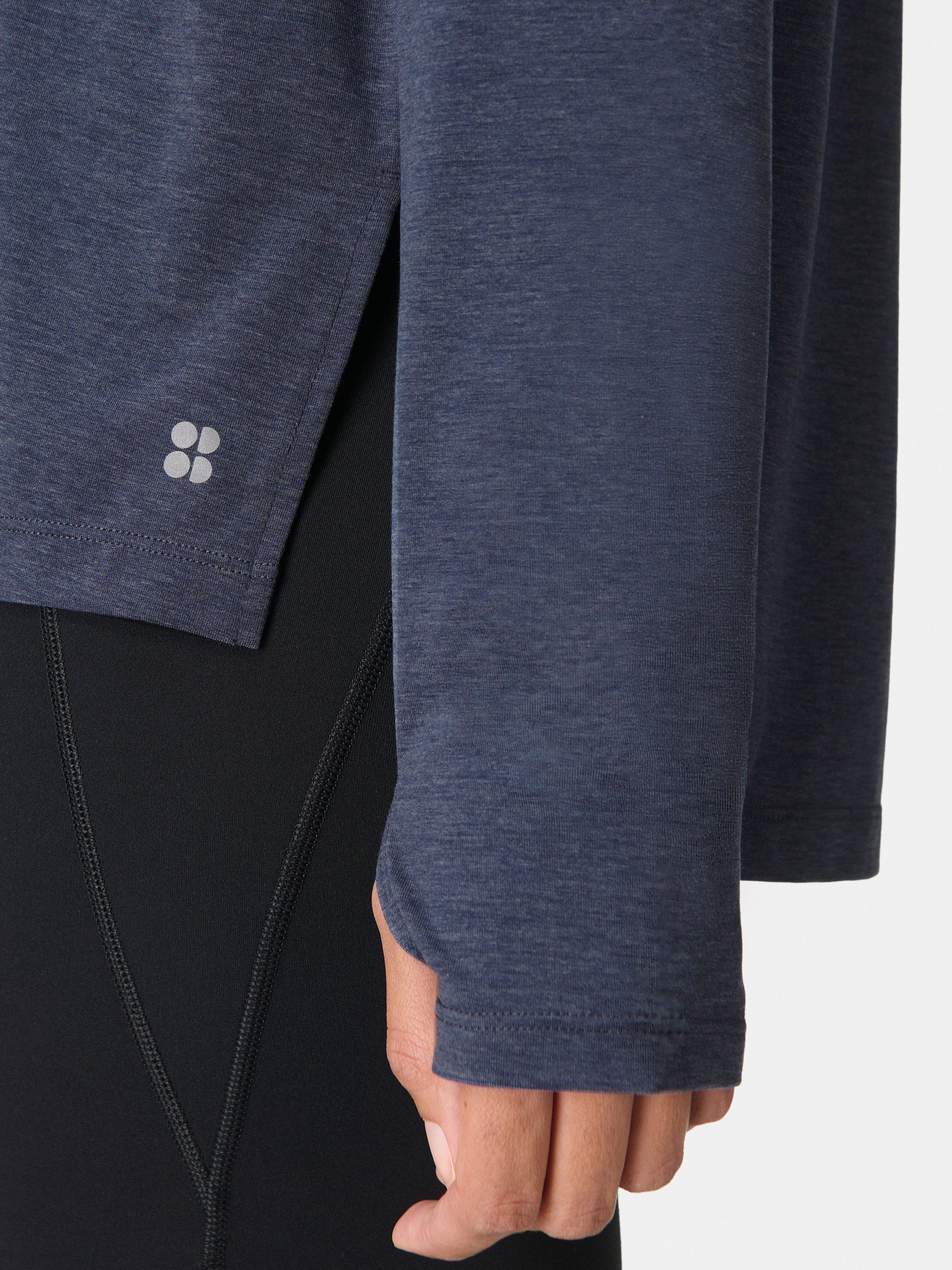Product image 6 of 7, which shows Sweaty Betty Soft Flow Studio Longline Long Sleeve Top, Navy Blue, XXS