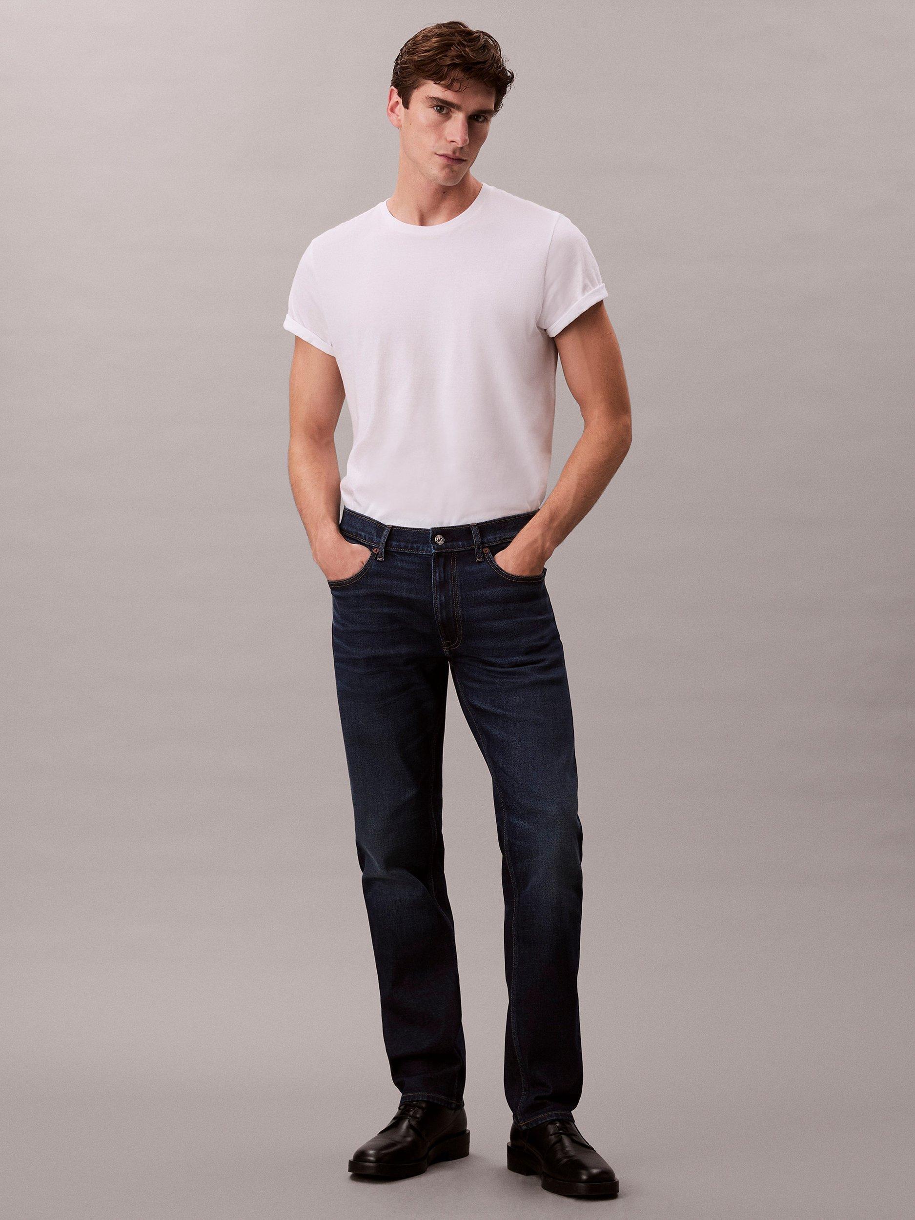 Product image 1 of 7, which shows Calvin Klein Slim Mid Rise Jeans, Dark Casper, 28R