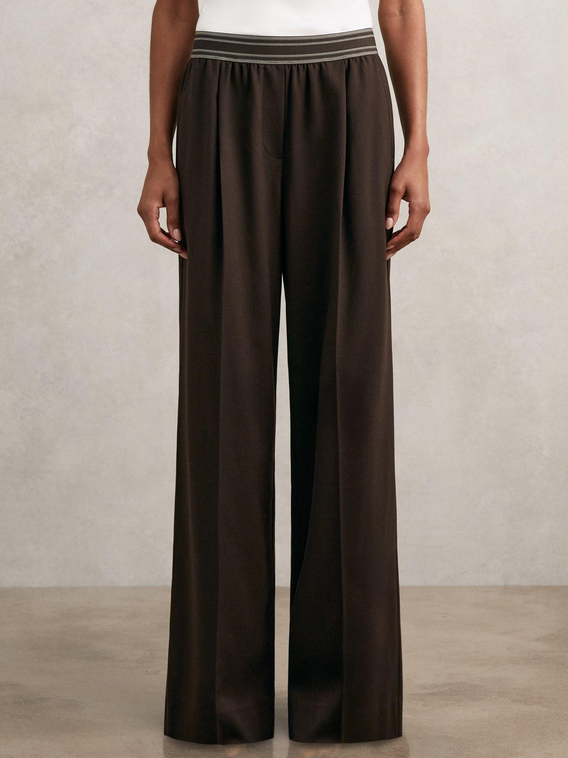 Product image 1 of 5, which shows Reiss Petite Camelia Wide Leg Trousers, Chocolate Brown, 6 Pt
