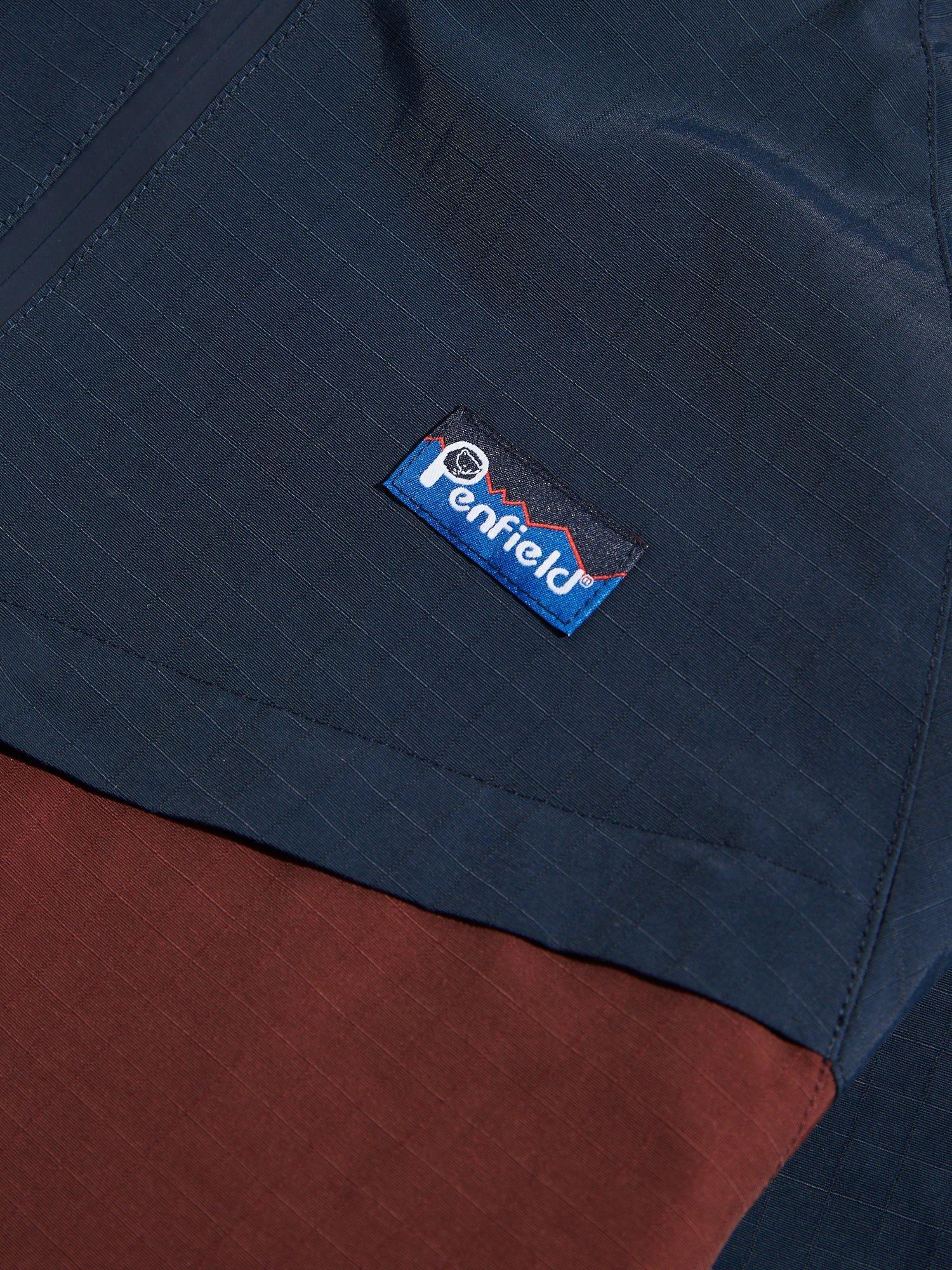 Product image 3 of 6, which shows Penfield Northrim Raincoat Jacket, Rum Raisin/Navy, S
