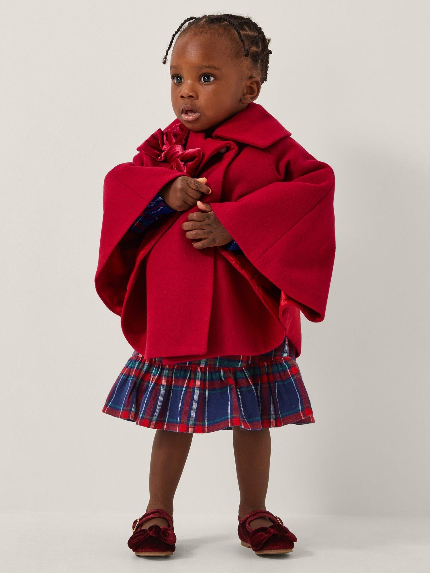Product image 1 of 4, which shows Monsoon Baby Velvet Bow Cape Coat, Red, 0-6 months