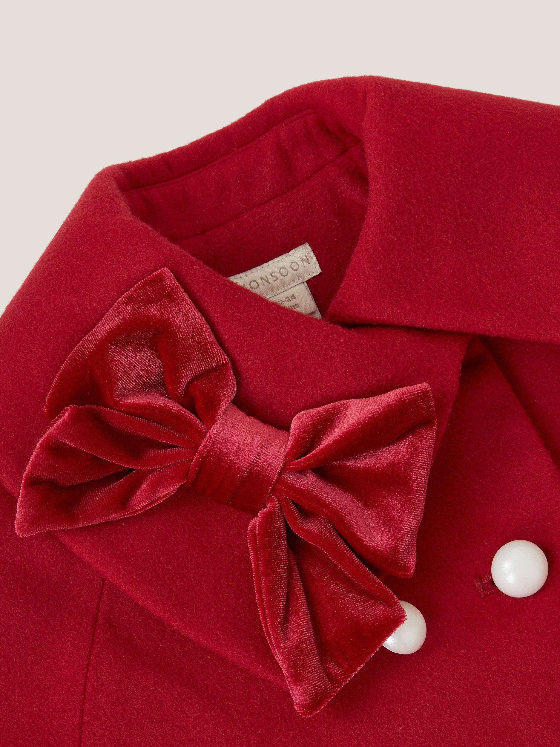 Product image 4 of 4, which shows Monsoon Baby Velvet Bow Cape Coat, Red, 0-6 months