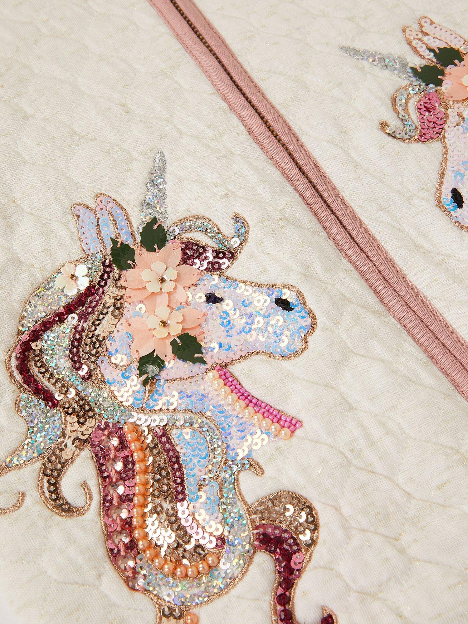 Product image 3 of 4, which shows Monsoon Kids' Unicorn Bomber Jacket, Ivory, 3-4 years