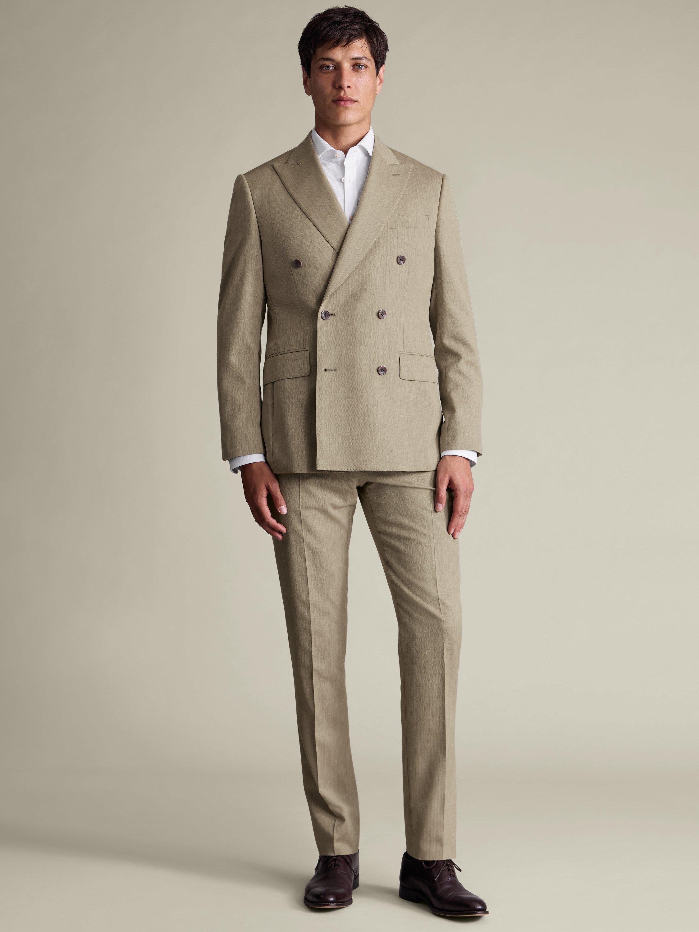 Product image 4 of 4, which shows Charles Tyrwhitt Herringbone Wool Suit Trousers, Stone, 30S