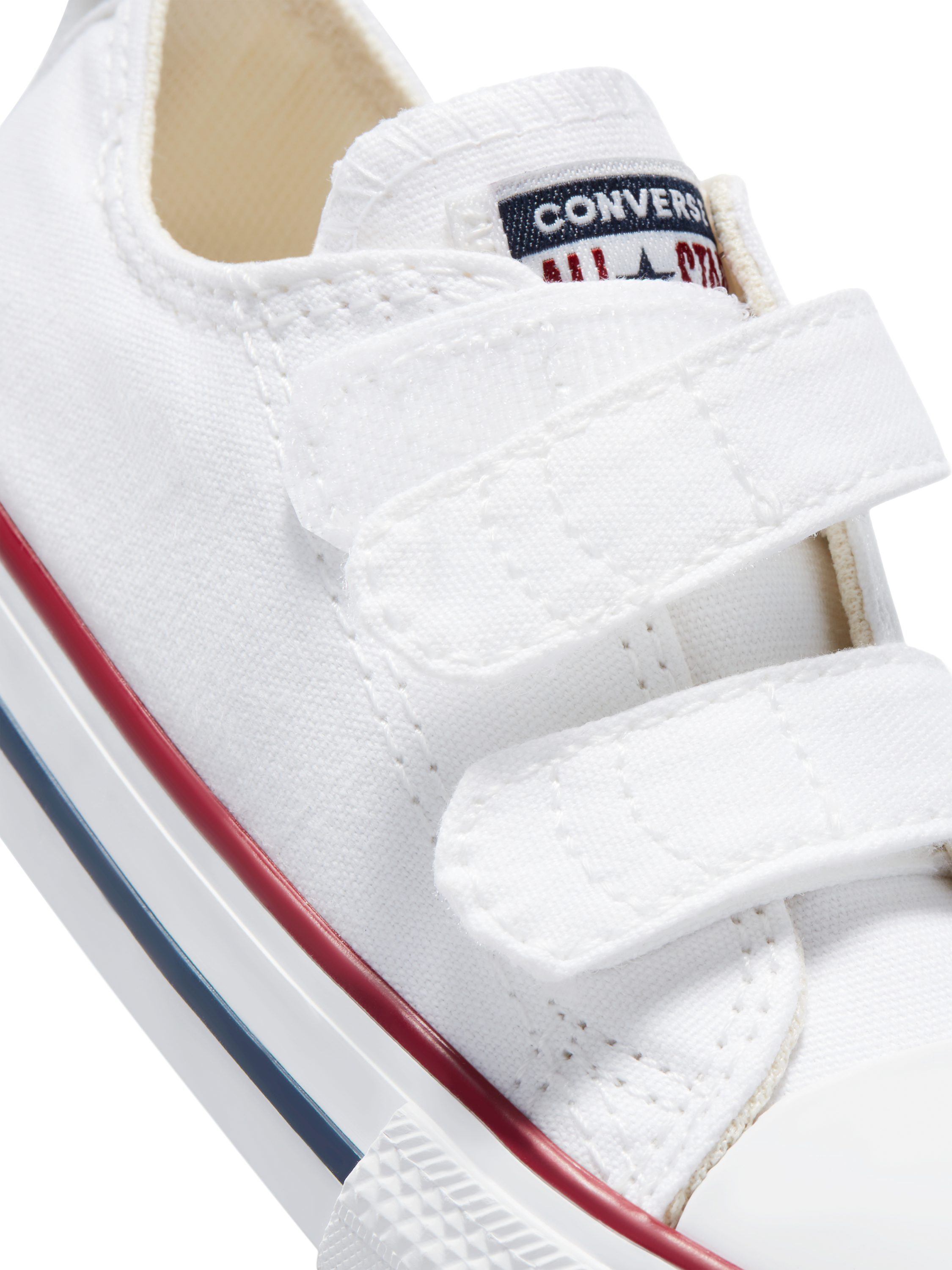 Product image 2 of 4, which shows Converse Kids' Chuck Taylor All Star Low-Top Trainers, White/Garnet/Navy, 4 Jnr