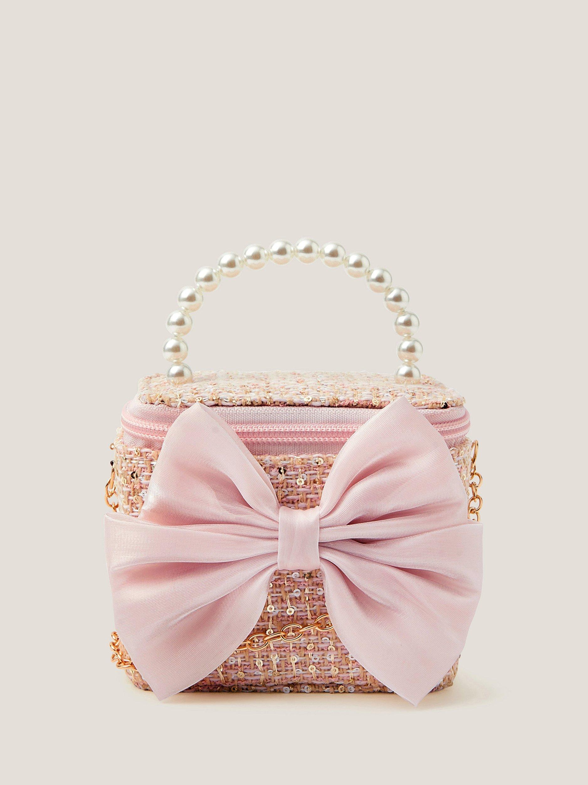 Product image 1 of 4, which shows Monsoon Kids' Tweed Bow Bag, Pink