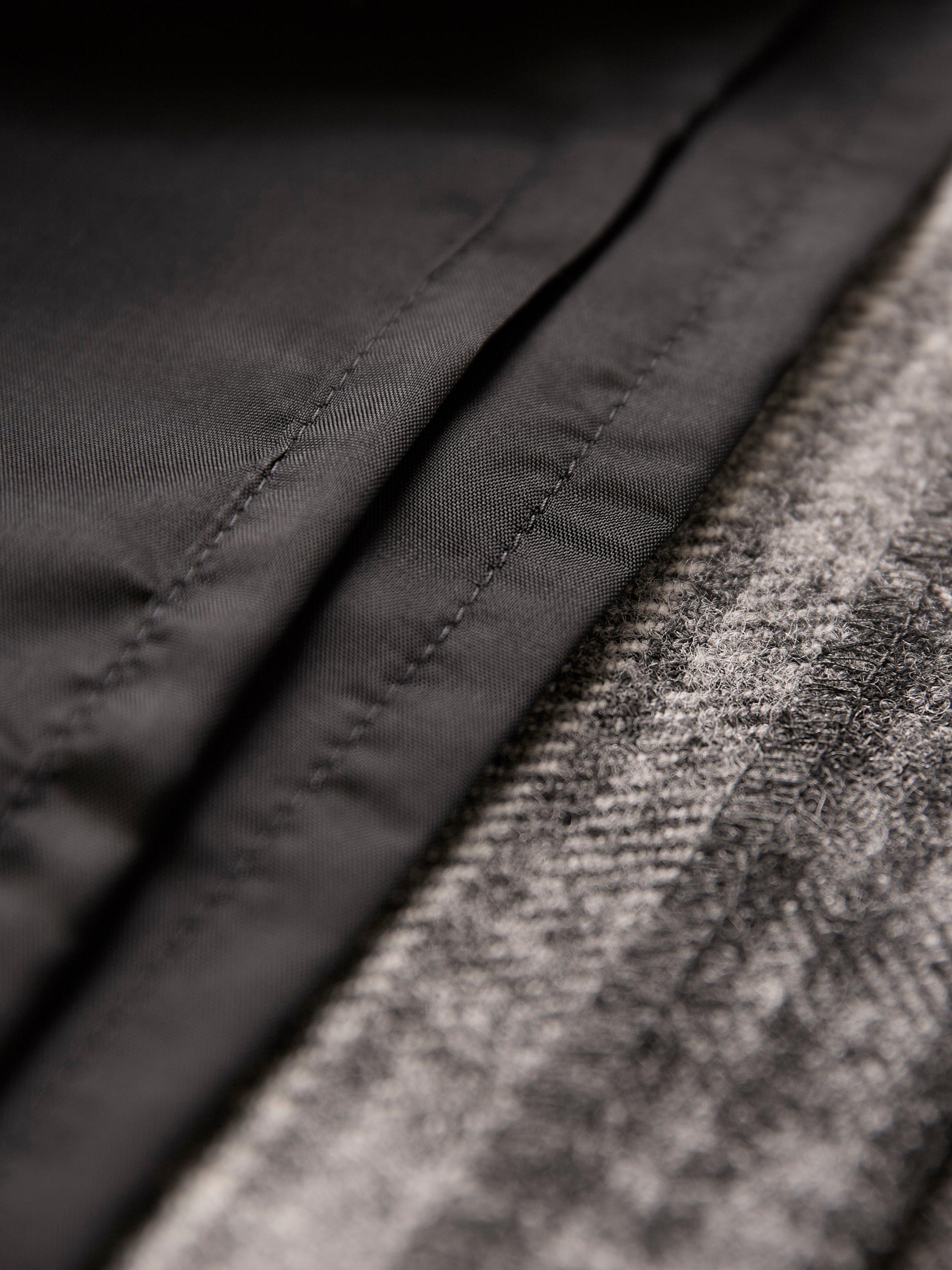 Product image 6 of 7, which shows Celtic & Co. High Rise Celt Wool Mini Skirt, Black/Grey, 8