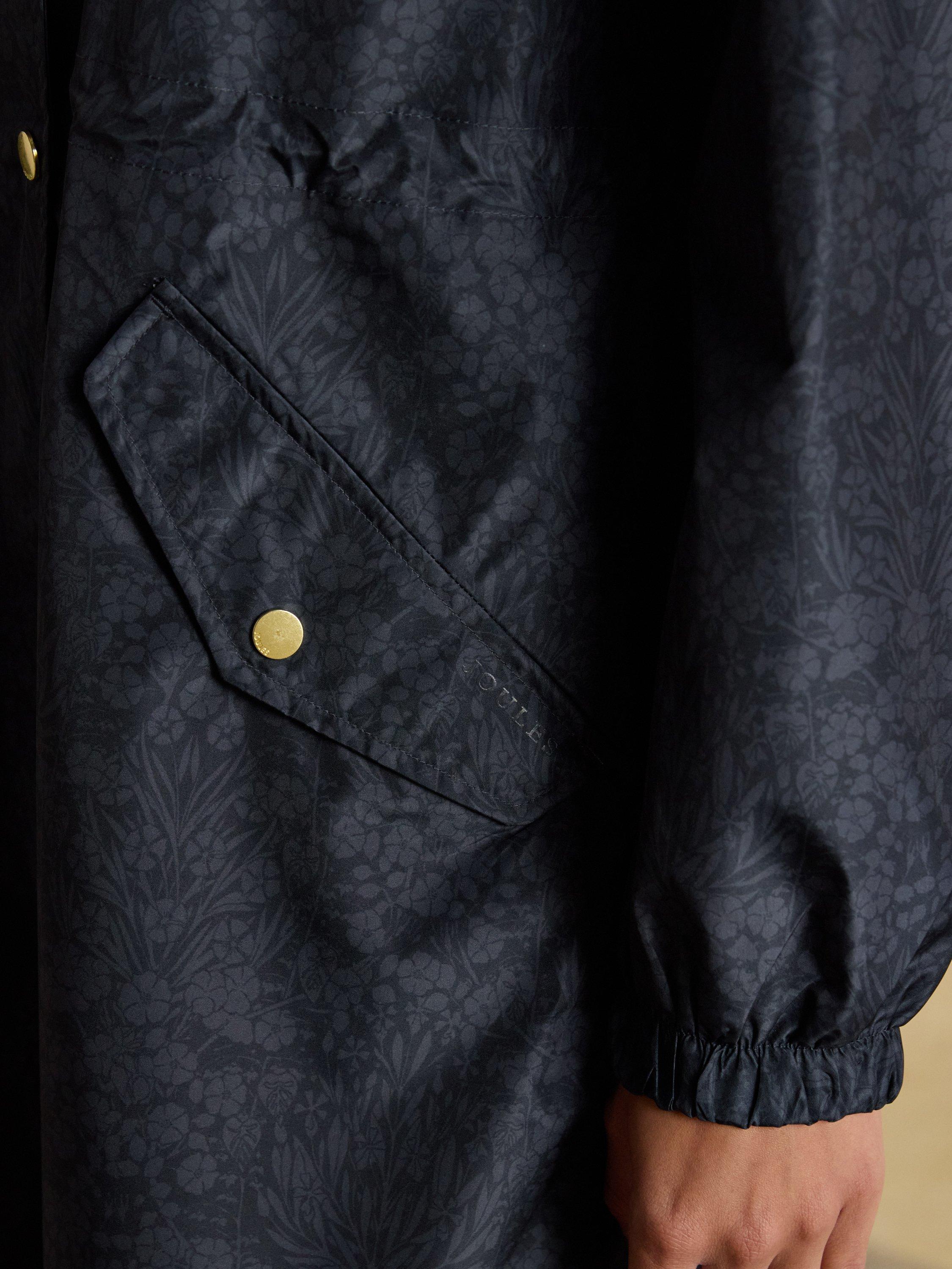 Product image 5 of 8, which shows Joules Holkham Floral Waterproof Raincoat, Navy, 6