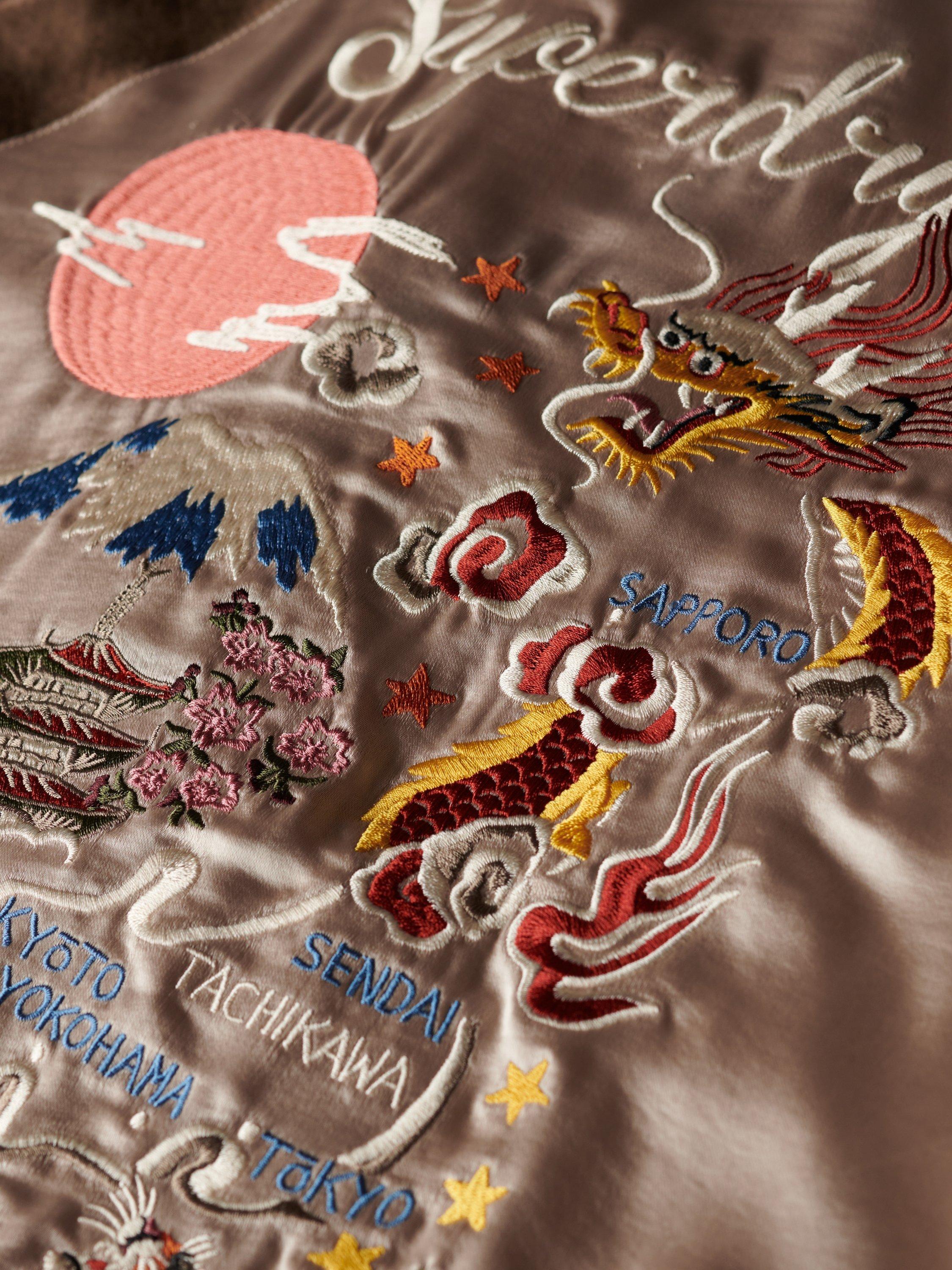 Product image 7 of 7, which shows Superdry Suikajan Embroidered Bomber Jacket, Champagne/Bronze, 12