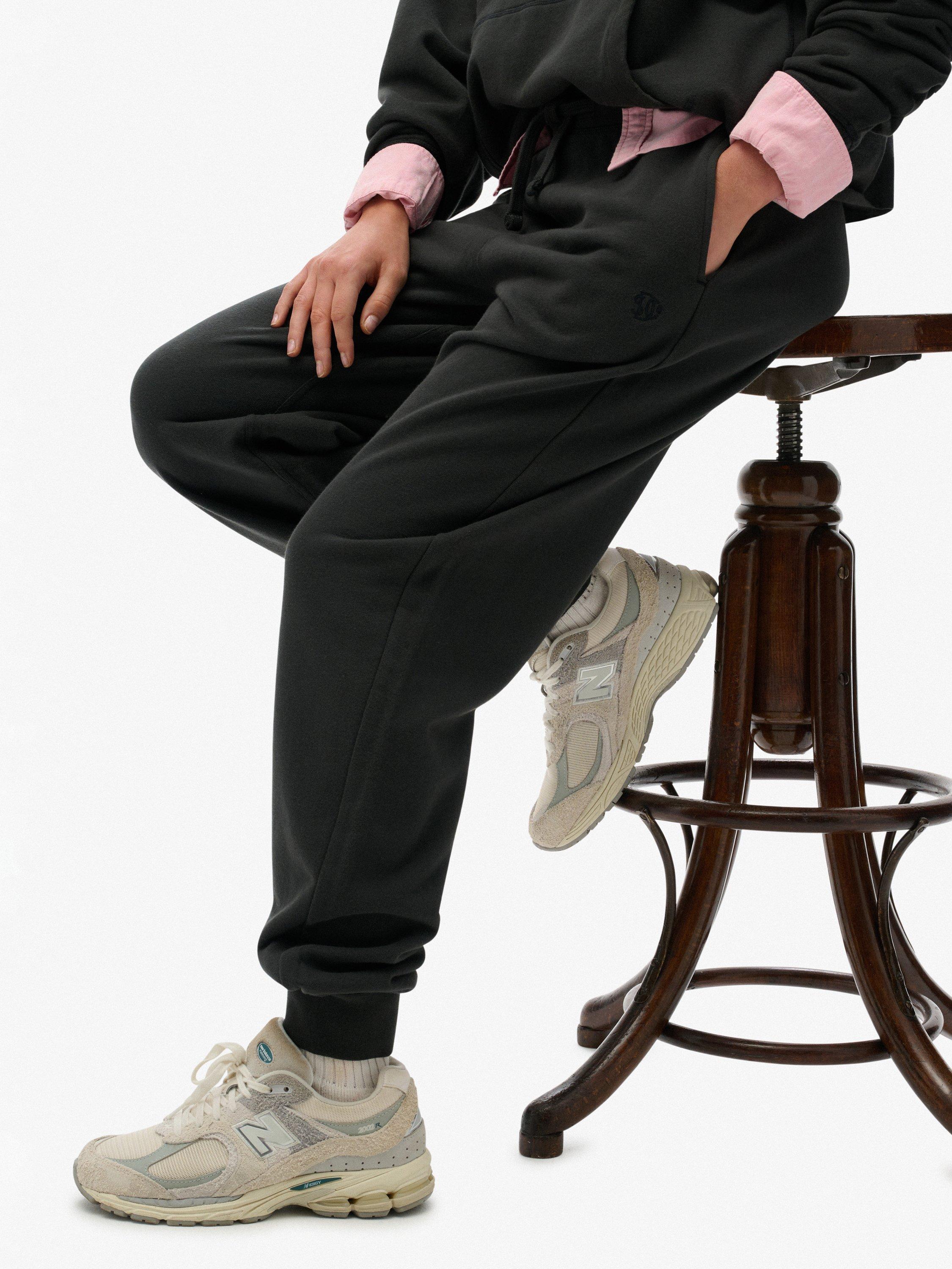 Product image 6 of 7, which shows Superdry Studios Cuffed Joggers, Washed Black, 14