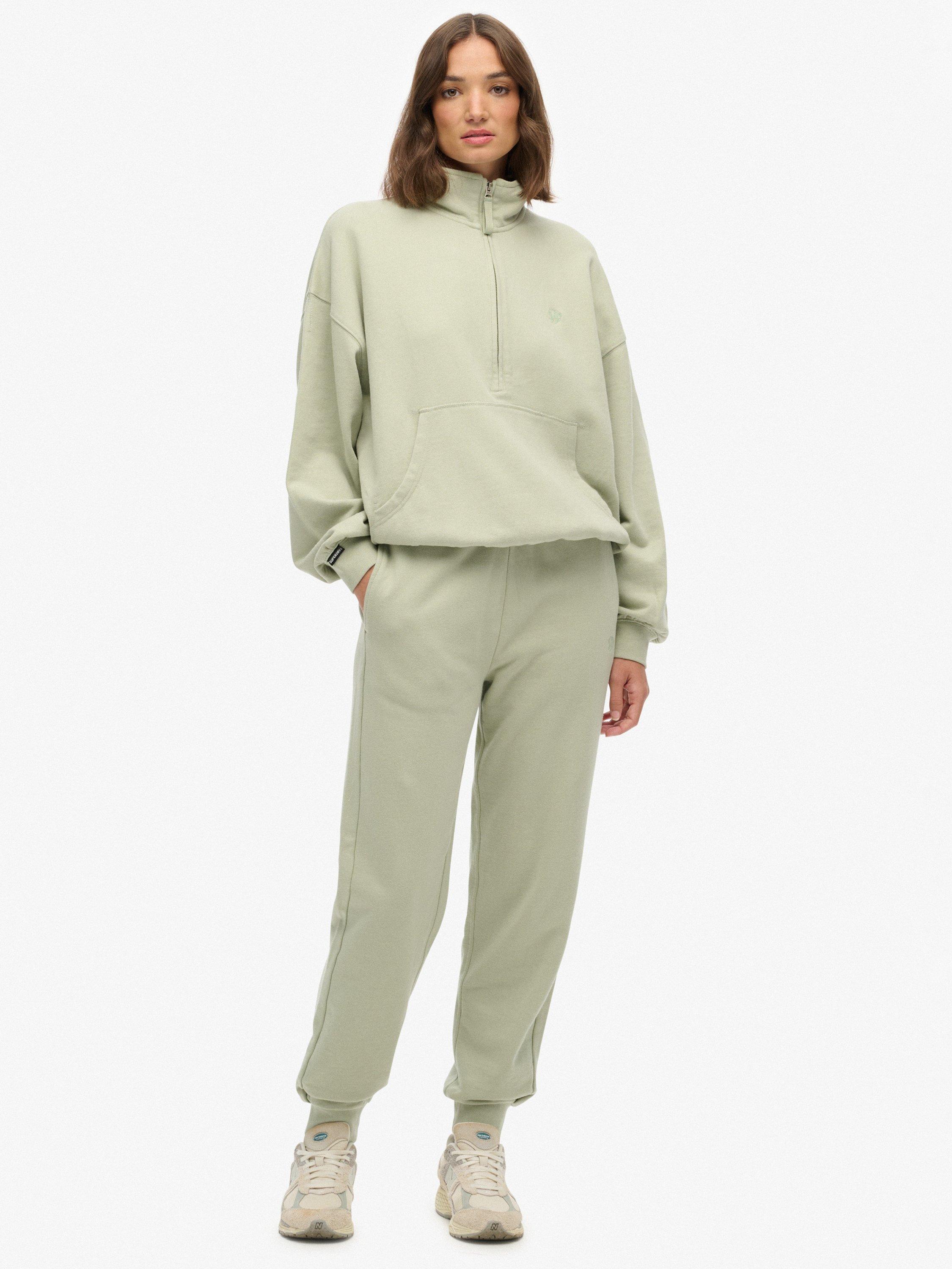 Product image 1 of 7, which shows Superdry Studios Cuffed Joggers, Dusty Sage, 12