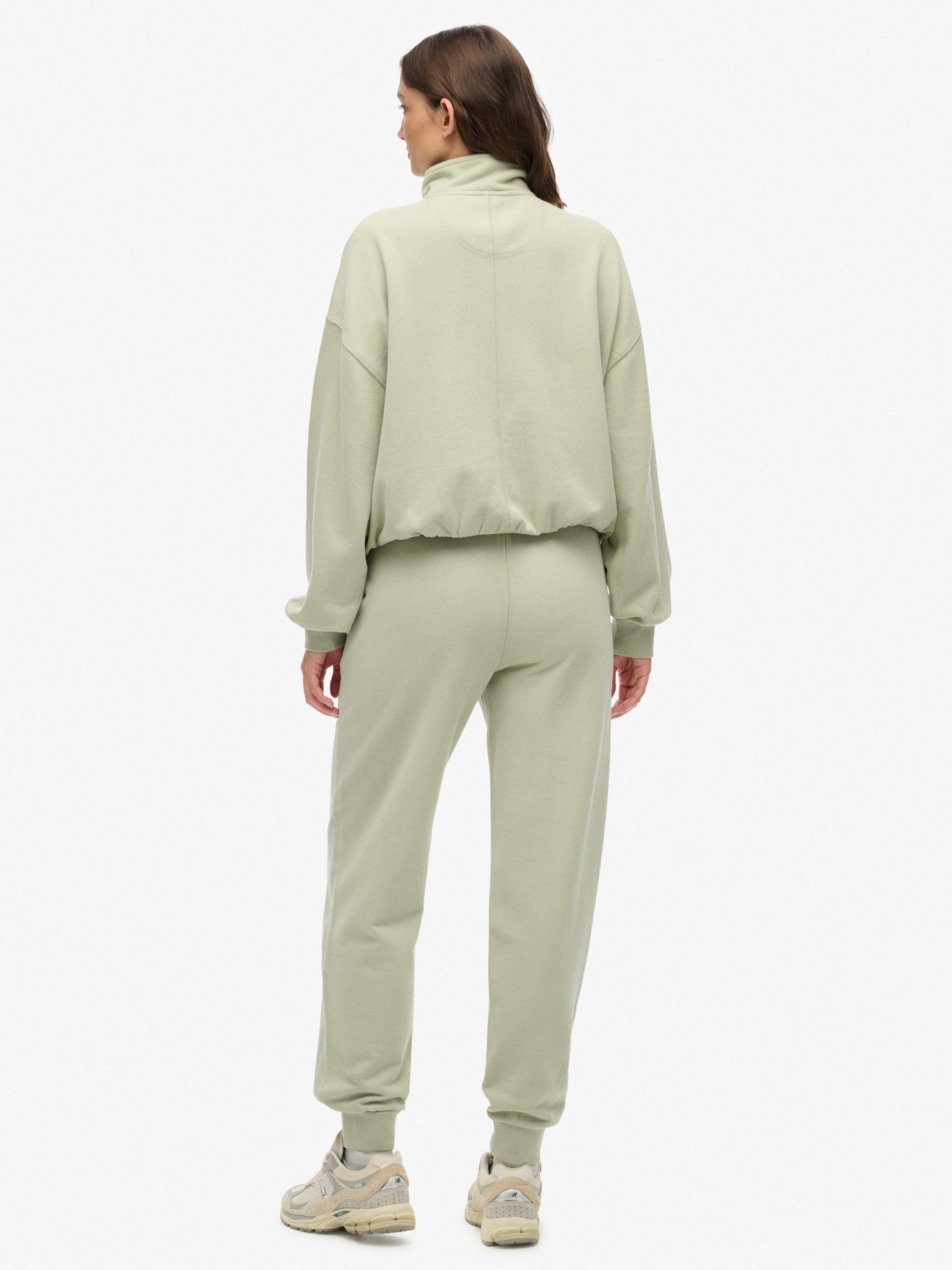 Product image 2 of 7, which shows Superdry Studios Cuffed Joggers, Dusty Sage, 12