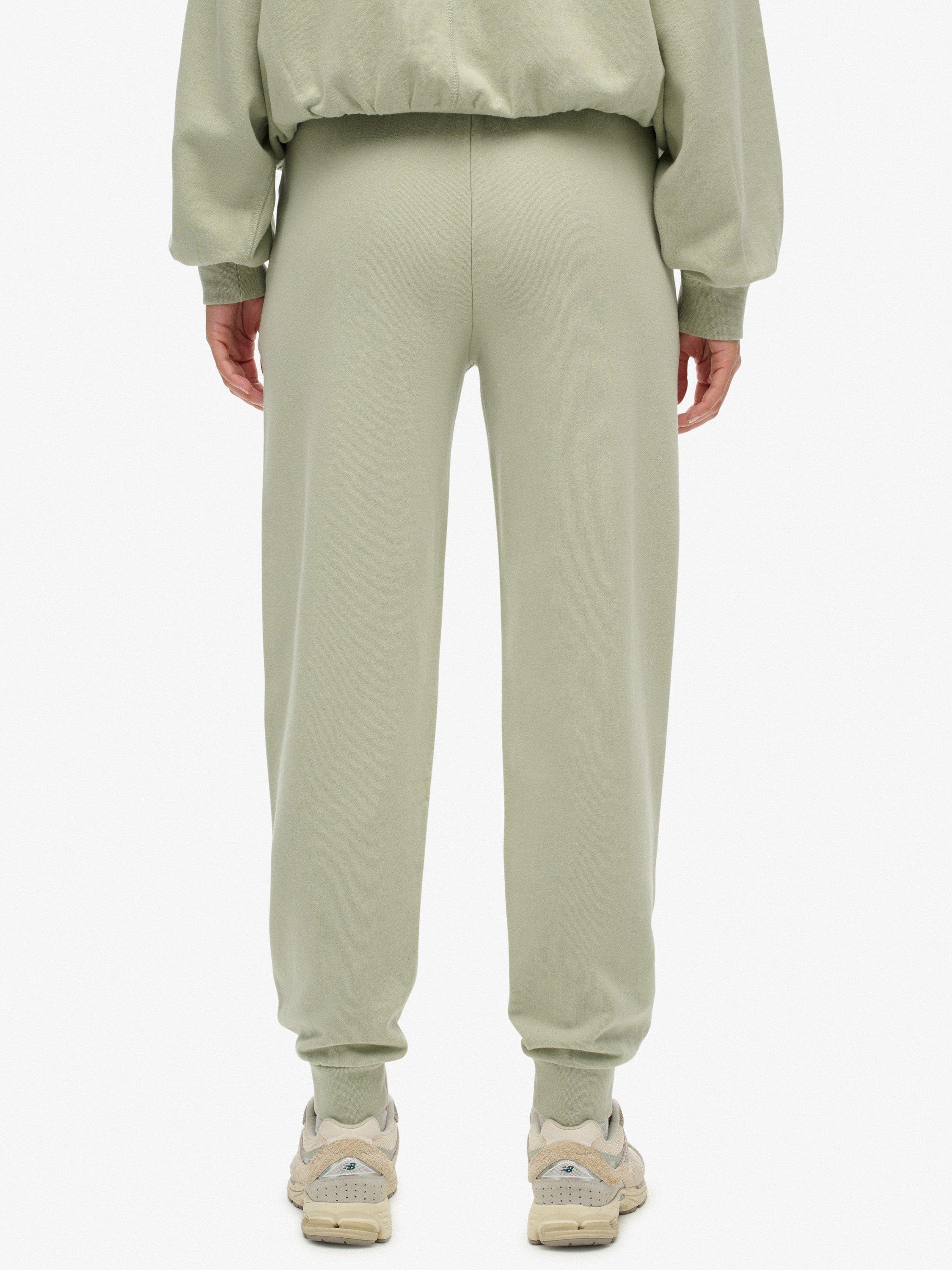 Product image 4 of 7, which shows Superdry Studios Cuffed Joggers, Dusty Sage, 12