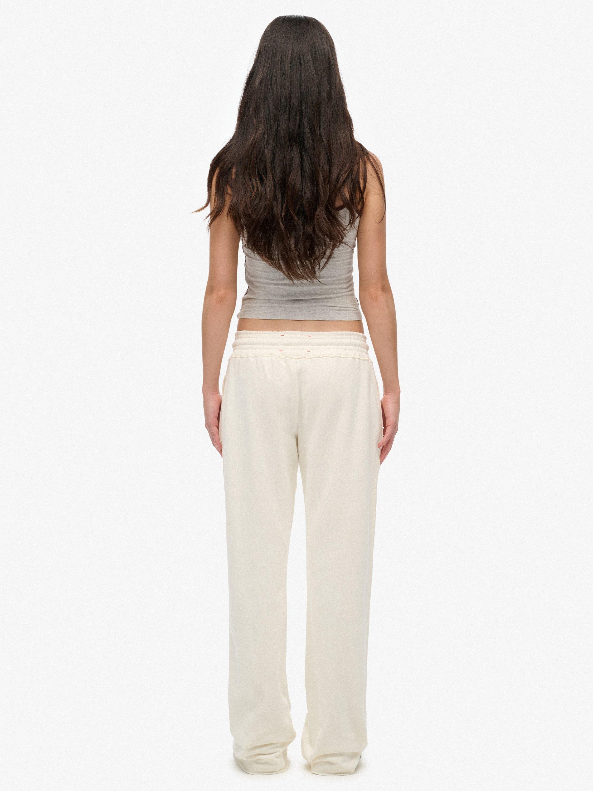 Product image 2 of 7, which shows Superdry Athletic Print Flare Joggers, Off White, 8