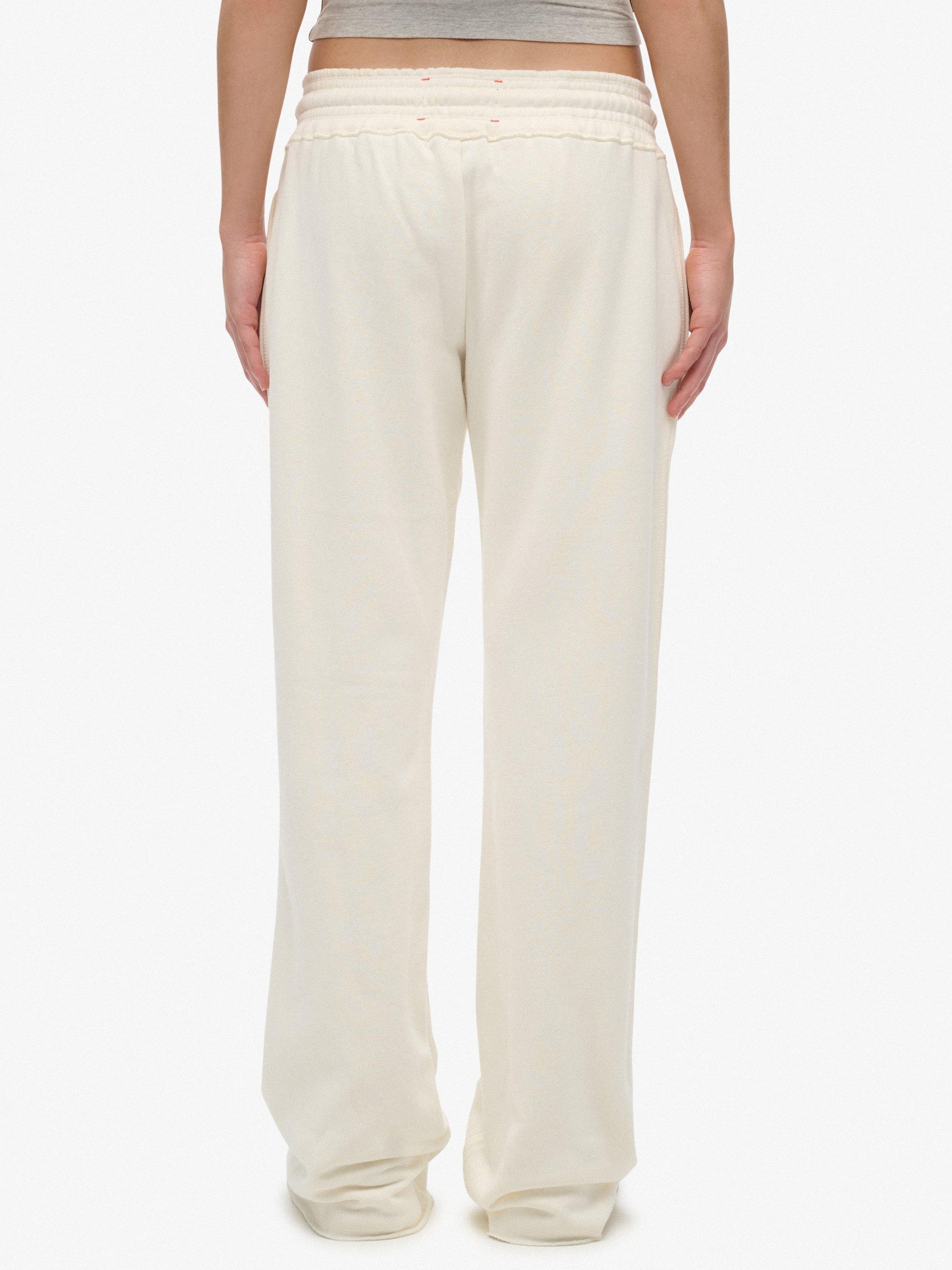 Product image 4 of 7, which shows Superdry Athletic Print Flare Joggers, Off White, 8