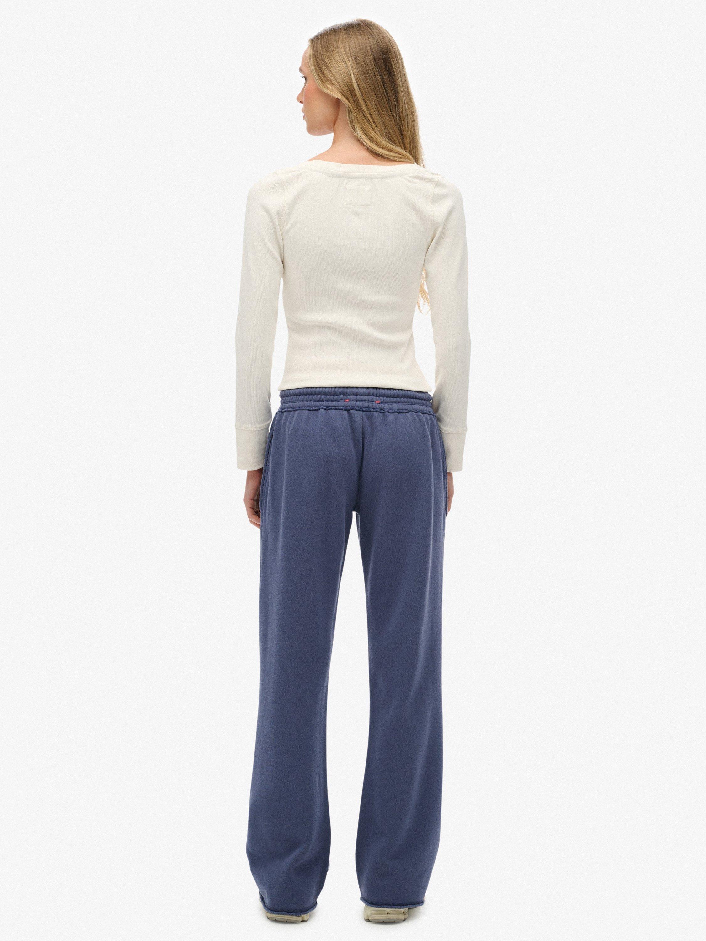 Product image 2 of 7, which shows Superdry Athletic Print Flare Joggers, Mariner Navy, 14