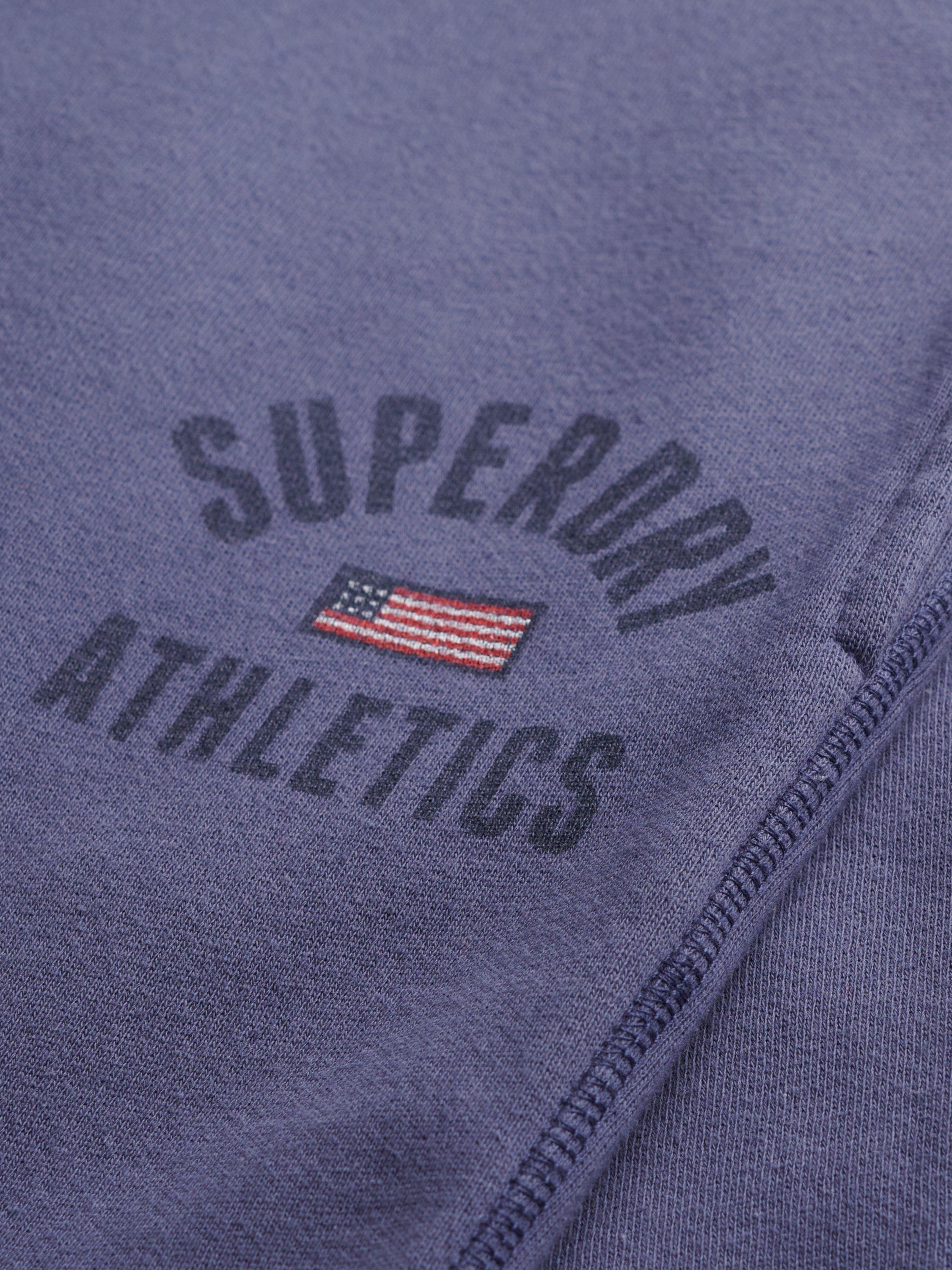 Product image 7 of 7, which shows Superdry Athletic Print Flare Joggers, Mariner Navy, 14
