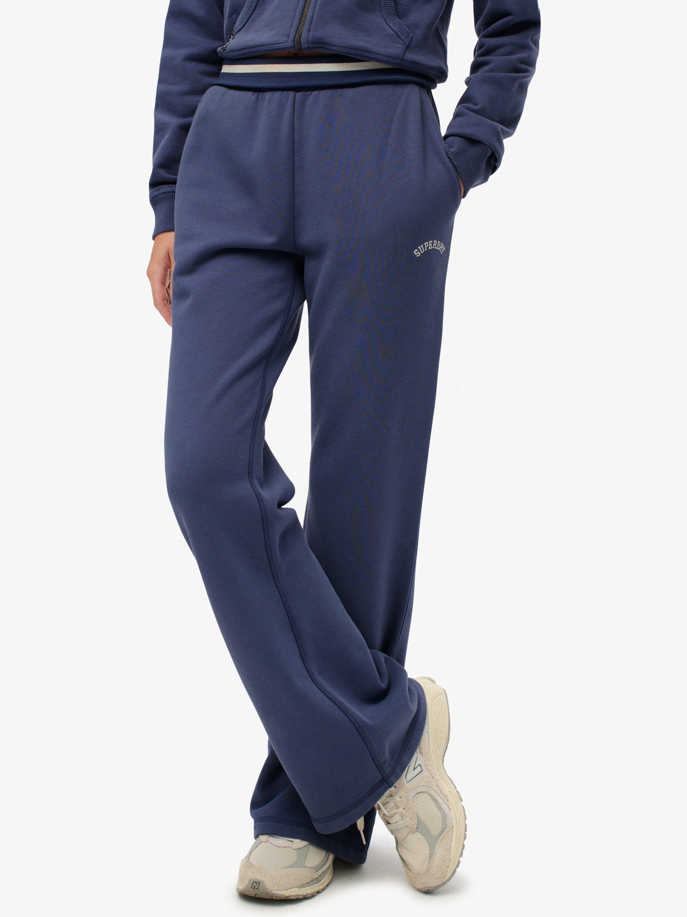 Product image 6 of 7, which shows Superdry Athletic Essentials Logo Low Rise Flare Joggers, Mariner Navy, 10