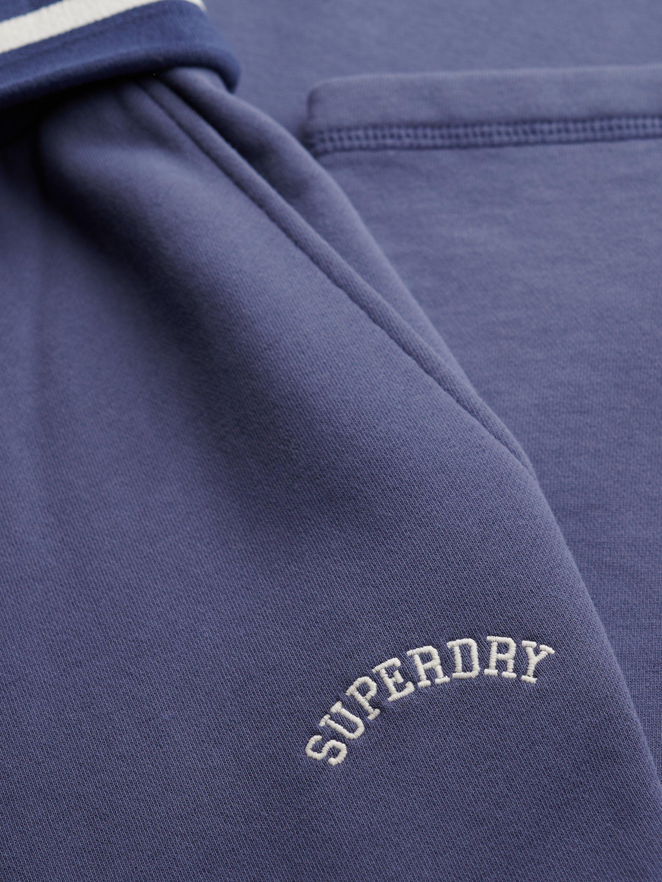 Product image 7 of 7, which shows Superdry Athletic Essentials Logo Low Rise Flare Joggers, Mariner Navy, 10