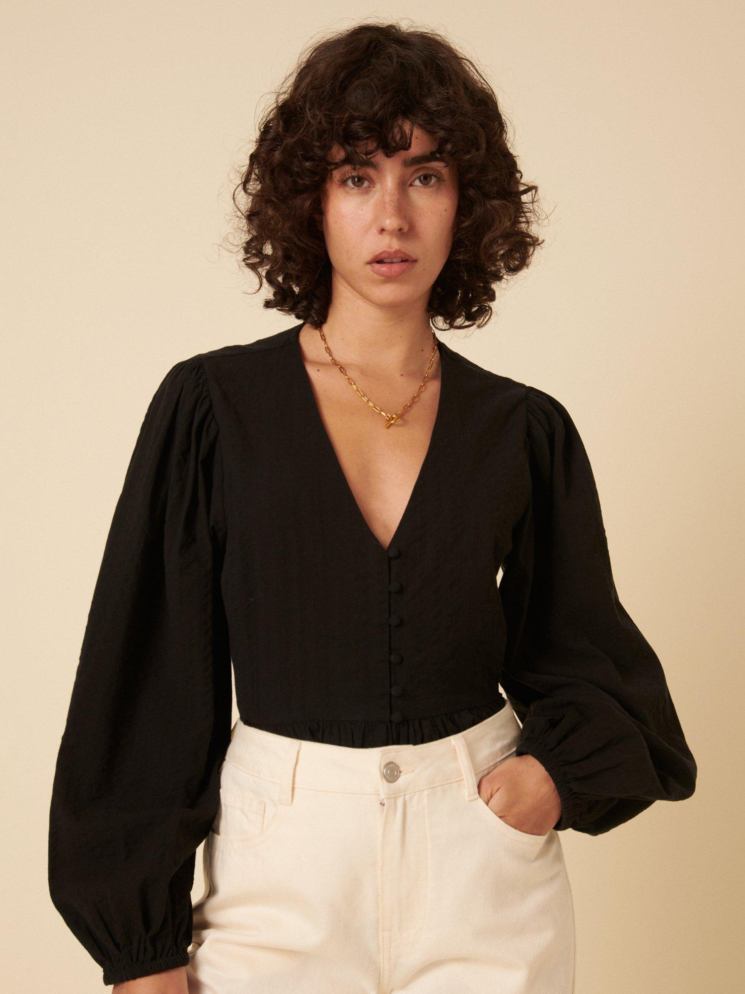 Product image 1 of 4, which shows Nobody's Child Ria Peplum Hem Top, Black, 10