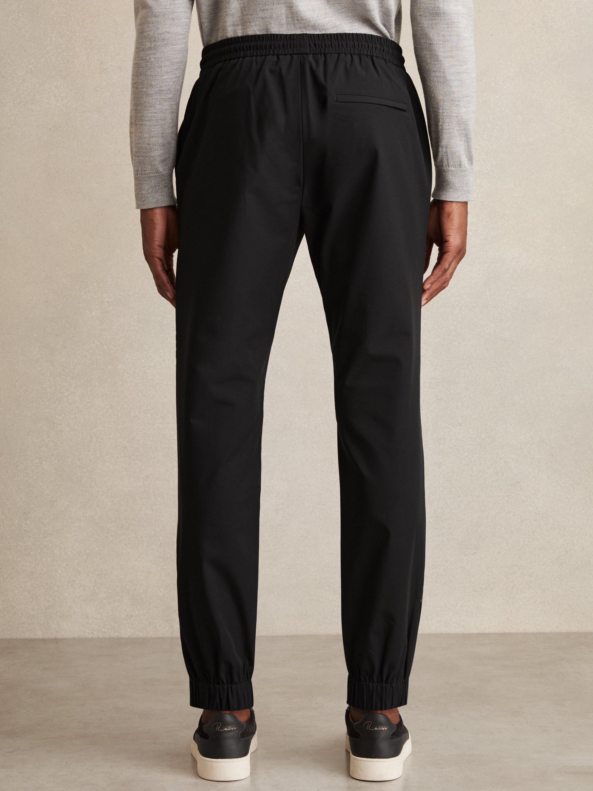 Product image 2 of 5, which shows Reiss Climb Tapered Joggers, Black, 32R
