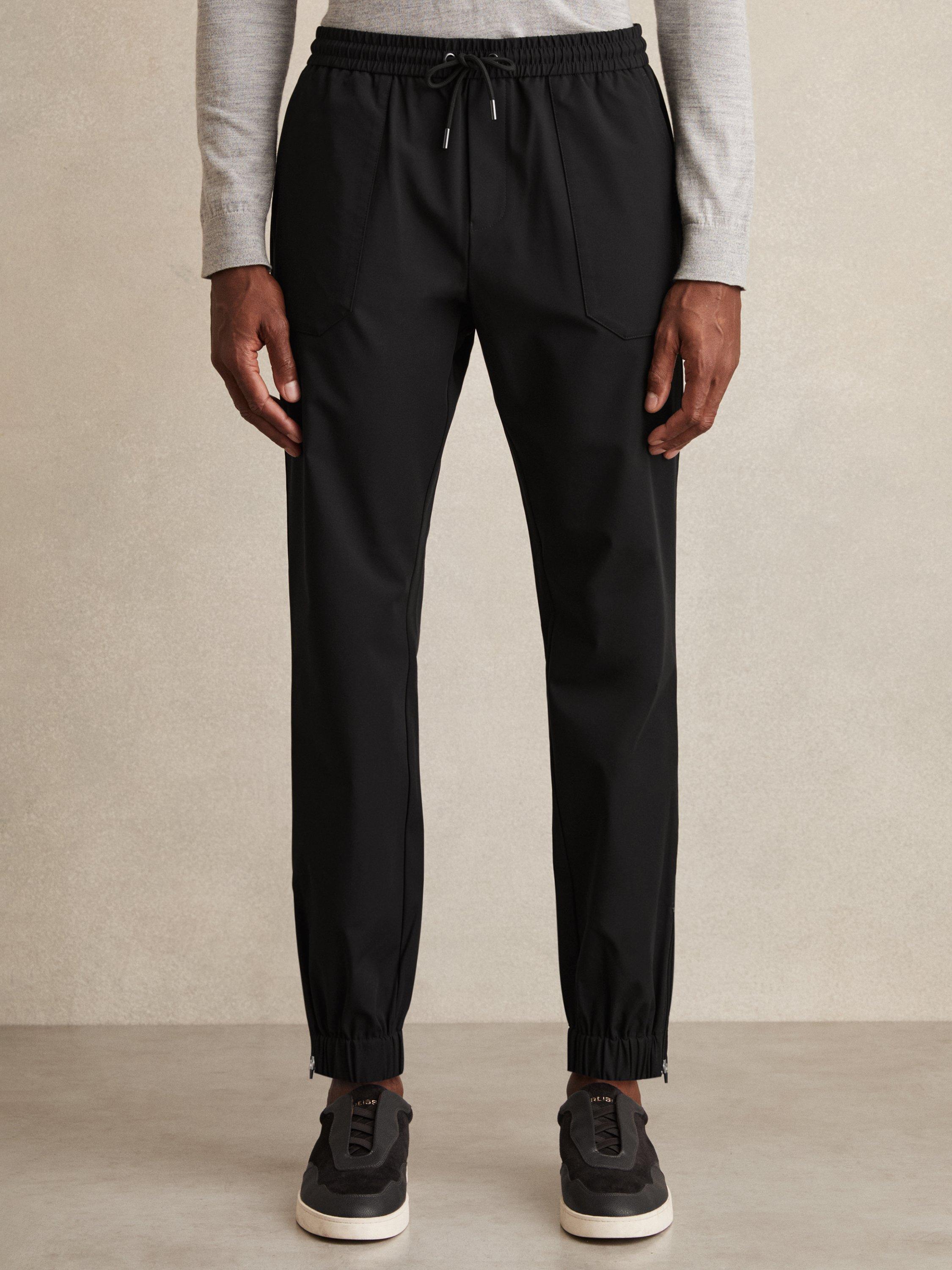 Product image 4 of 5, which shows Reiss Climb Tapered Joggers, Black, 32R