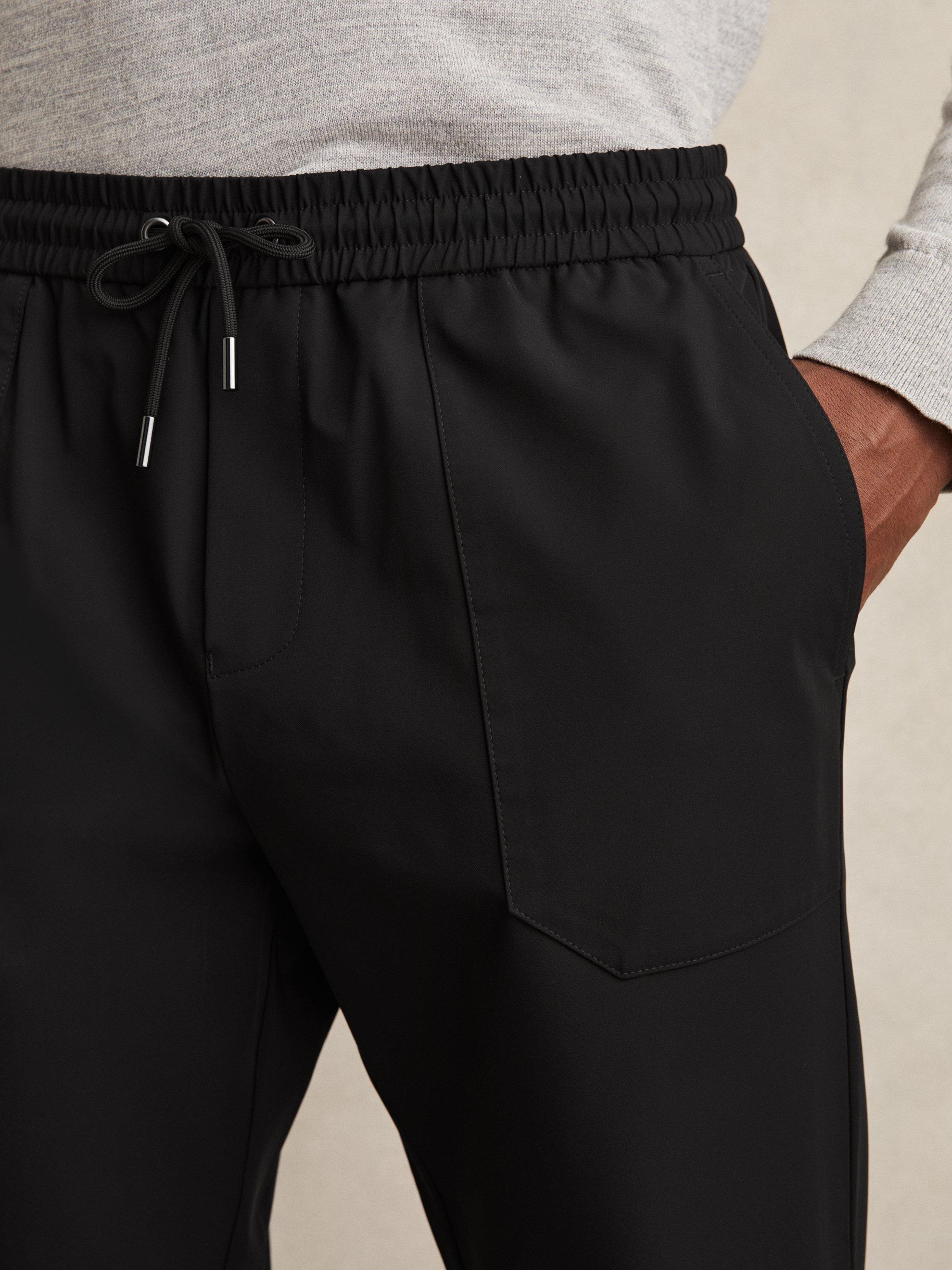 Product image 5 of 5, which shows Reiss Climb Tapered Joggers, Black, 32R