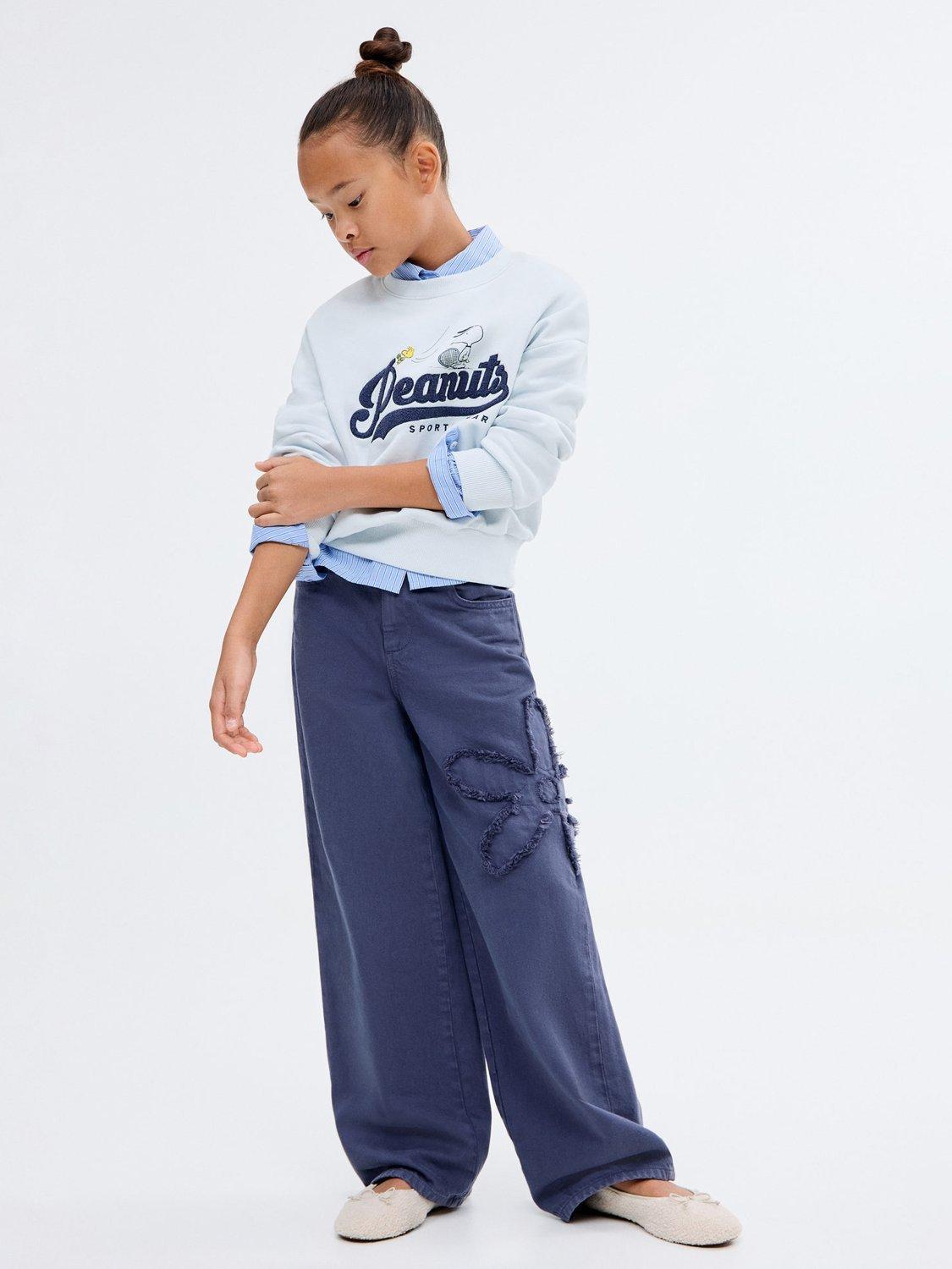 Product image 2 of 7, which shows Mango Kids' Cotton Snoopy Peanuts Sweatshirt, Pastel Blue, 5-6 years