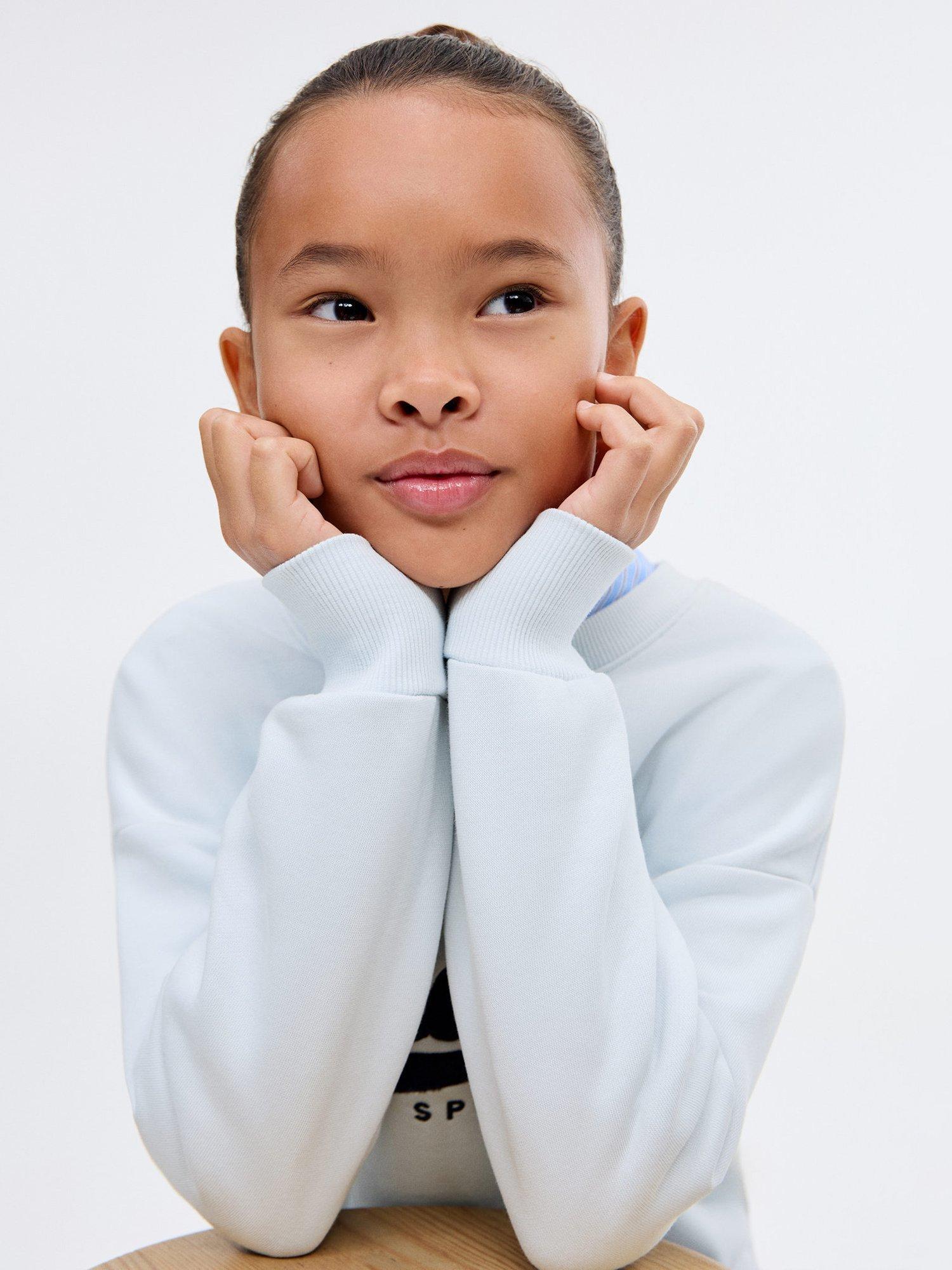 Product image 6 of 7, which shows Mango Kids' Cotton Snoopy Peanuts Sweatshirt, Pastel Blue, 5-6 years