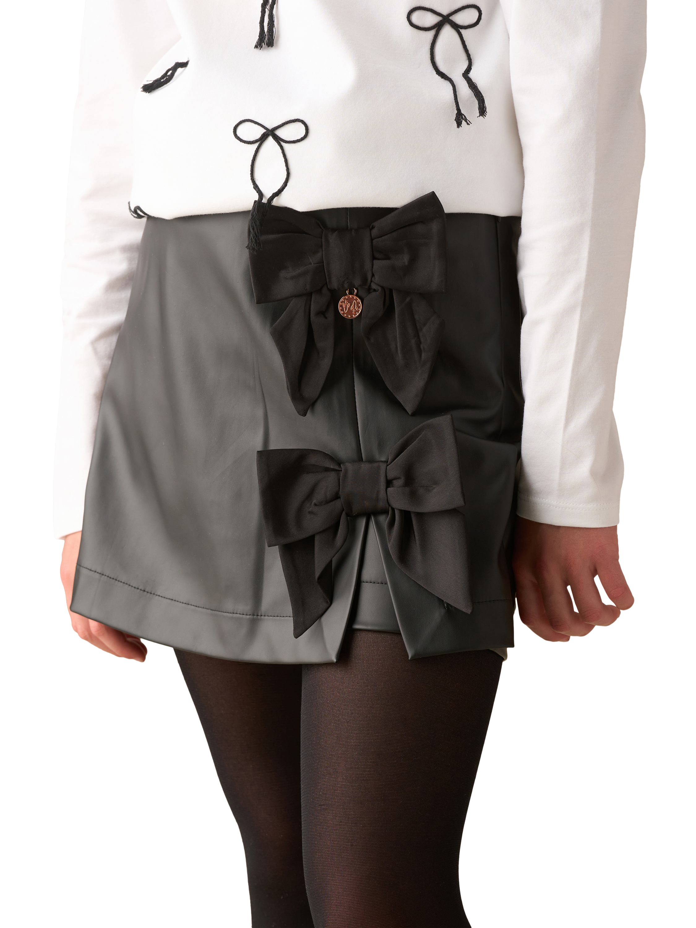 Product image 1 of 8, which shows Angel & Rocket Kids' Bow Faux Leather Skort, Black, 3 years