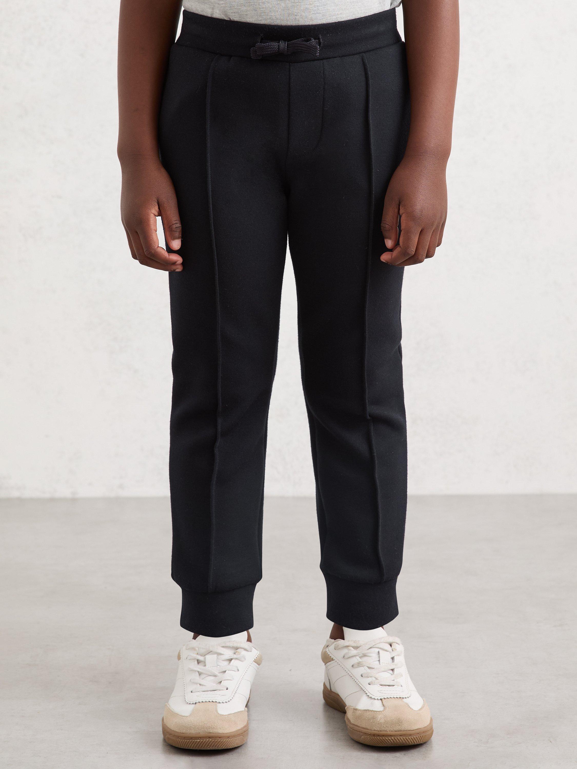 Product image 1 of 4, which shows Reiss Kids' Premier Tapered Drawstring Joggers, Navy Blue, 3-4 years