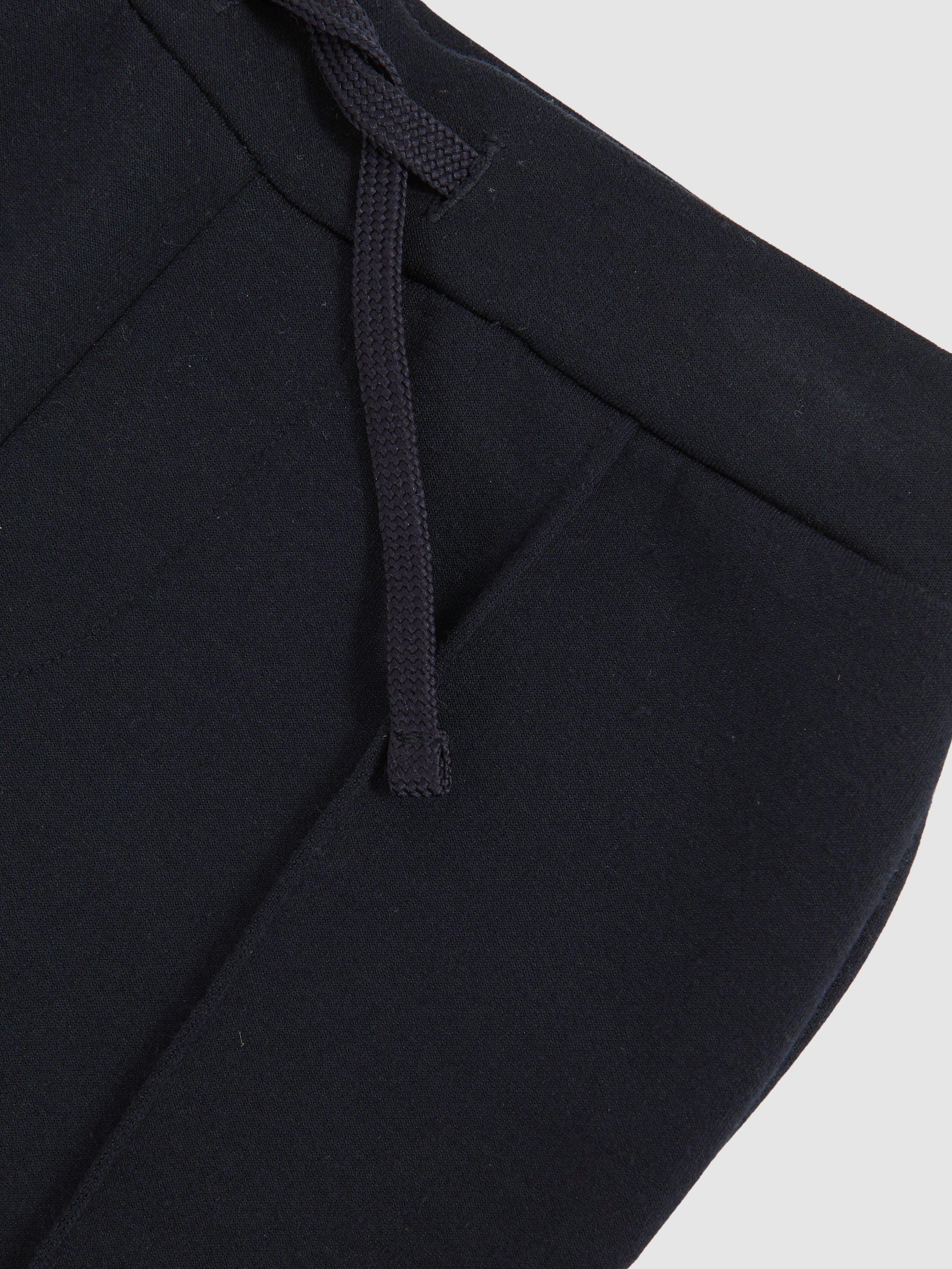 Product image 4 of 4, which shows Reiss Kids' Premier Tapered Drawstring Joggers, Navy Blue, 3-4 years