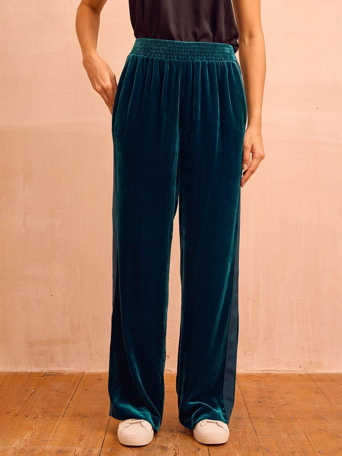 Product image 1 of 6, which shows Aspiga Velvet Side Stripe Trousers, Teal, XS